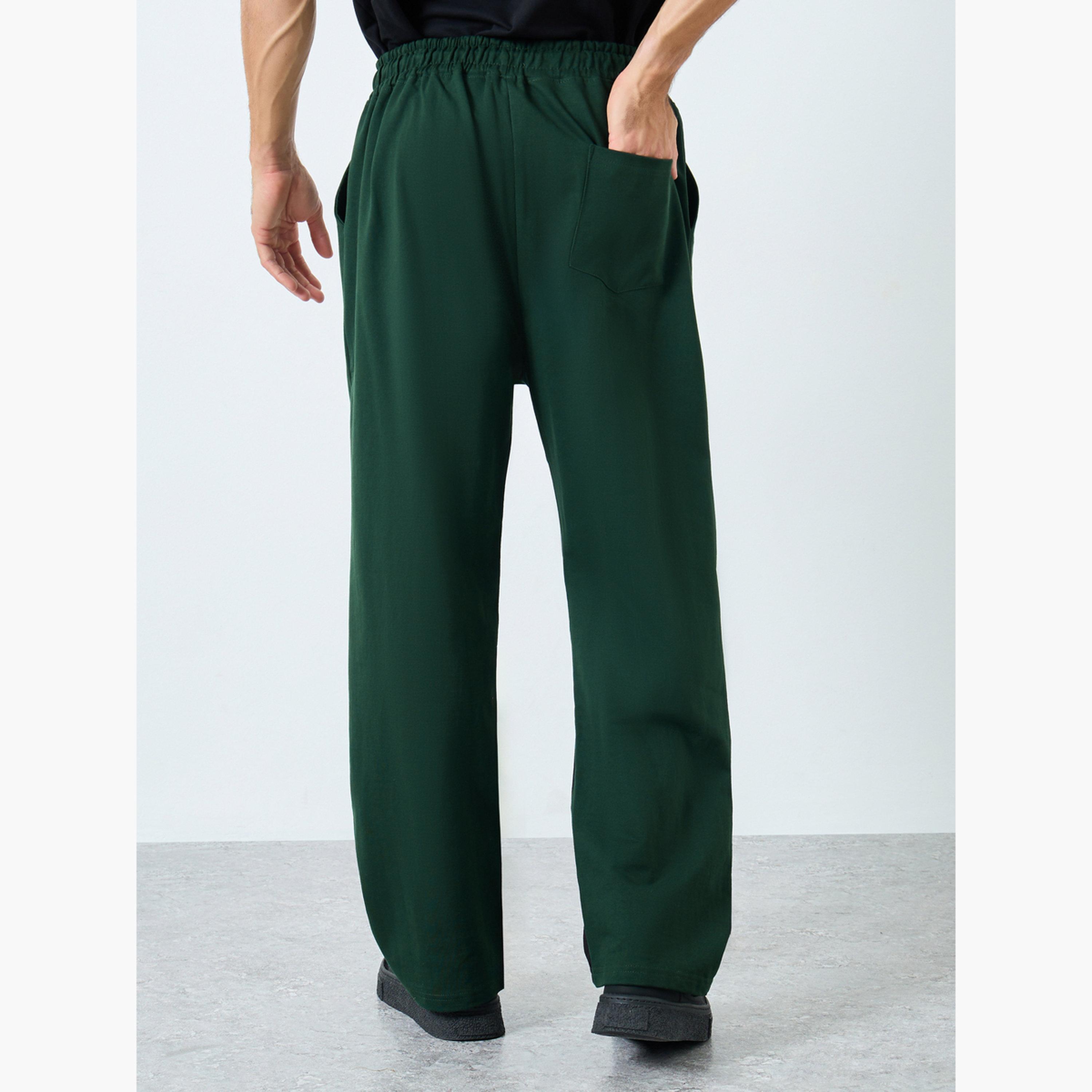 ستايلي - بنطال رياضي رجالي مقاس كبير اوفر سايز  بطبعة جرافيكية لون أخضر-men-clothing-bottoms-joggers-image-3