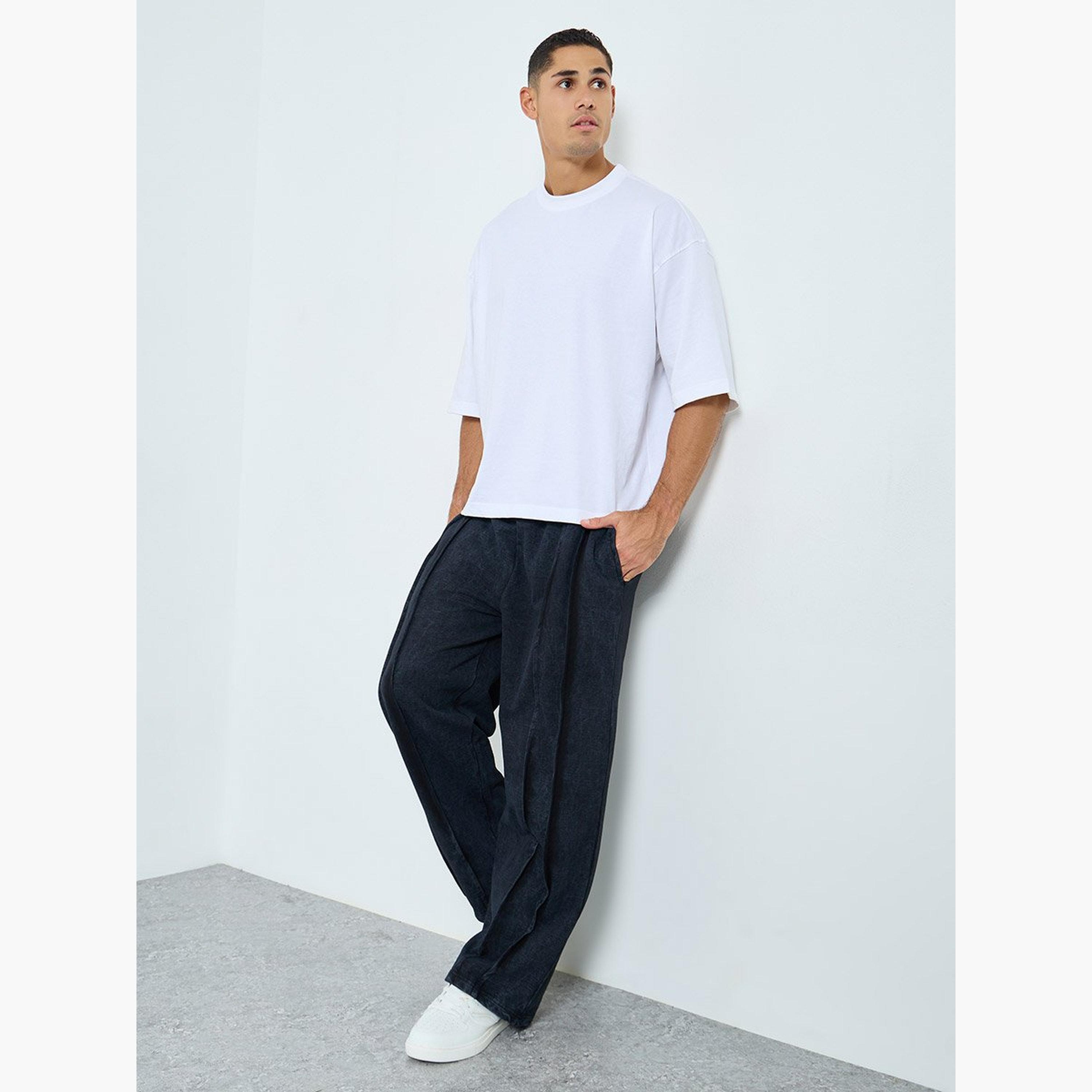 ستايلي - بنطال رياضي تيري واسع الساق مع تفاصيل مطوية-men-clothing-sportswearandactivewear-bottoms-joggers-image-2