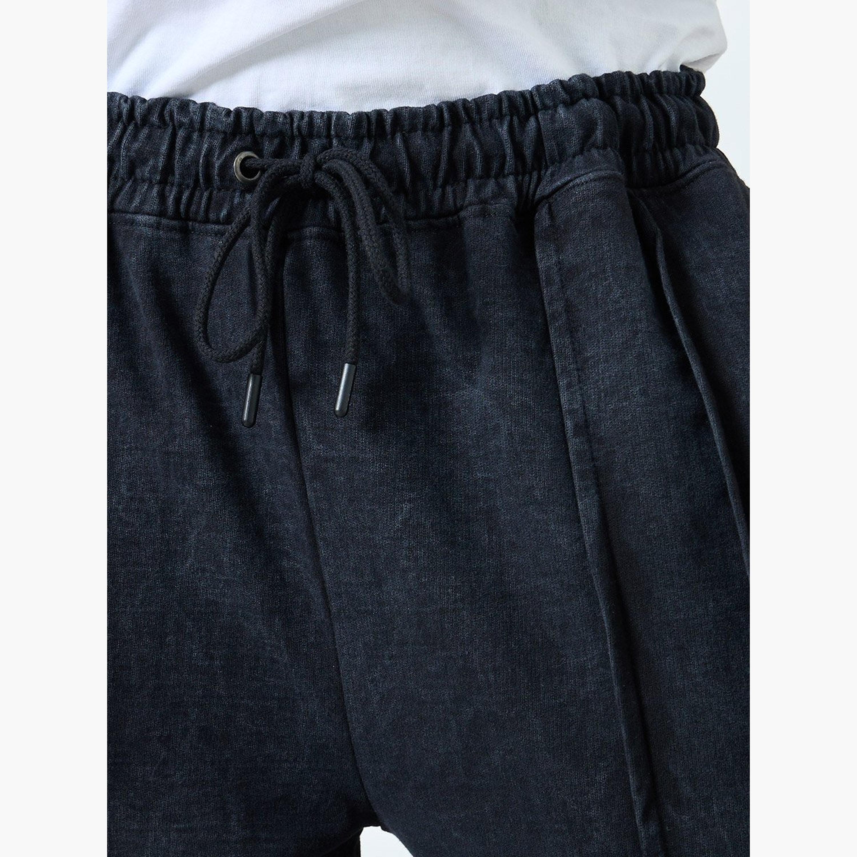 ستايلي - بنطال رياضي تيري واسع الساق مع تفاصيل مطوية-men-clothing-sportswearandactivewear-bottoms-joggers-image-3
