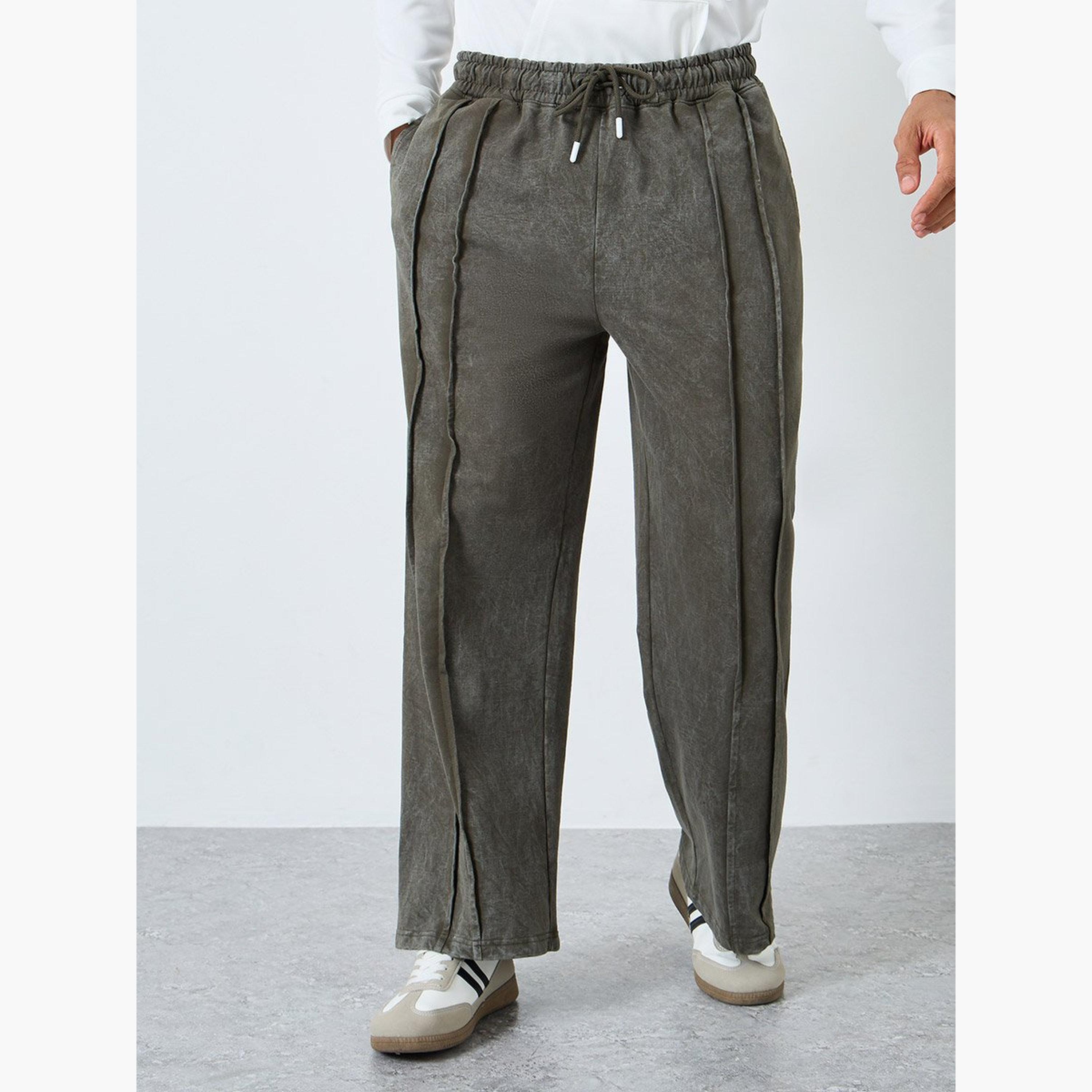 ستايلي - بنطال رياضي تيري واسع الساق مع تفاصيل مطوية-men-clothing-bottoms-joggers-image-1