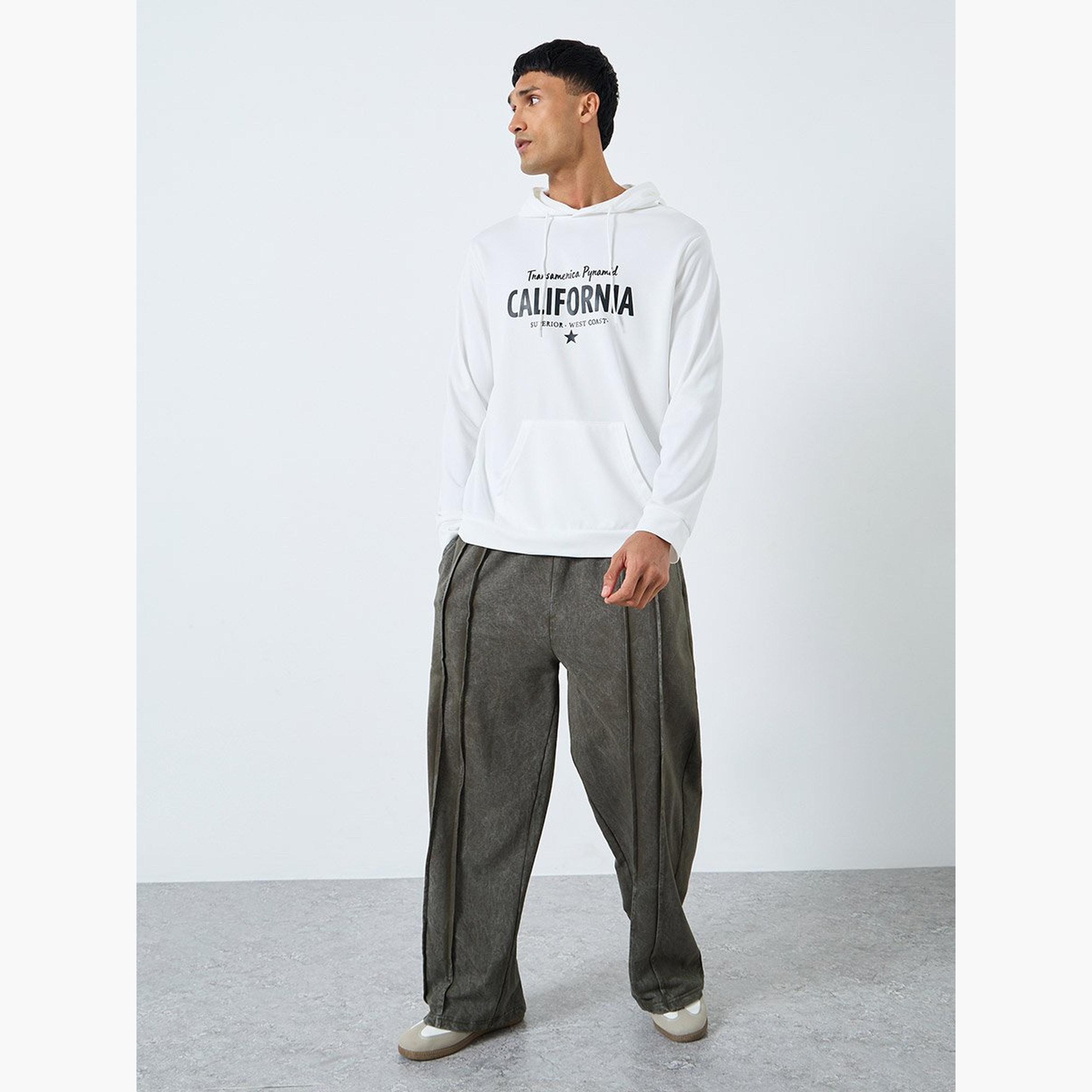 ستايلي - بنطال رياضي تيري واسع الساق مع تفاصيل مطوية-men-clothing-bottoms-joggers-image-2