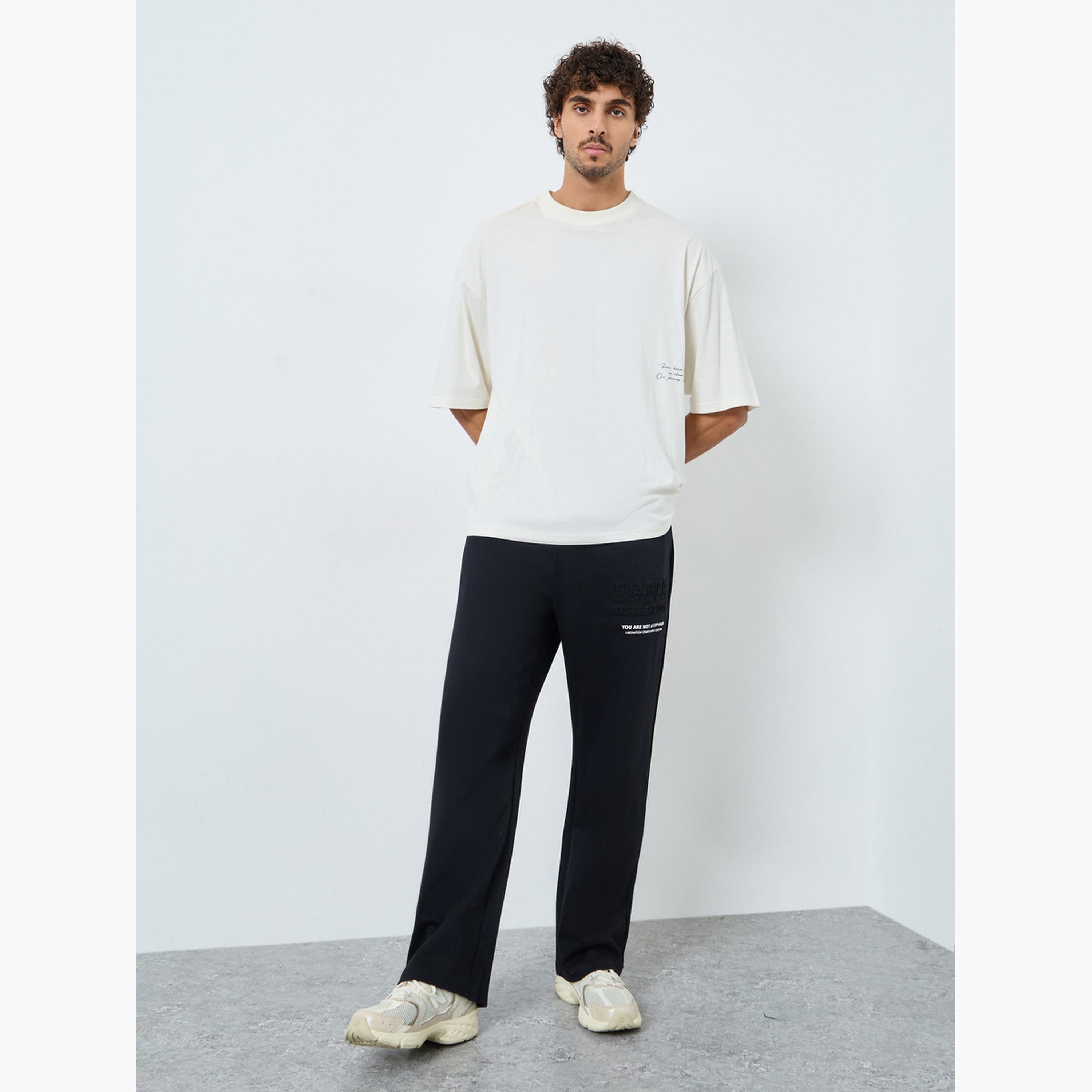 Styli Black Embossed Minimal Slogan Joggers-men-clothing-bottoms-joggers-image-2