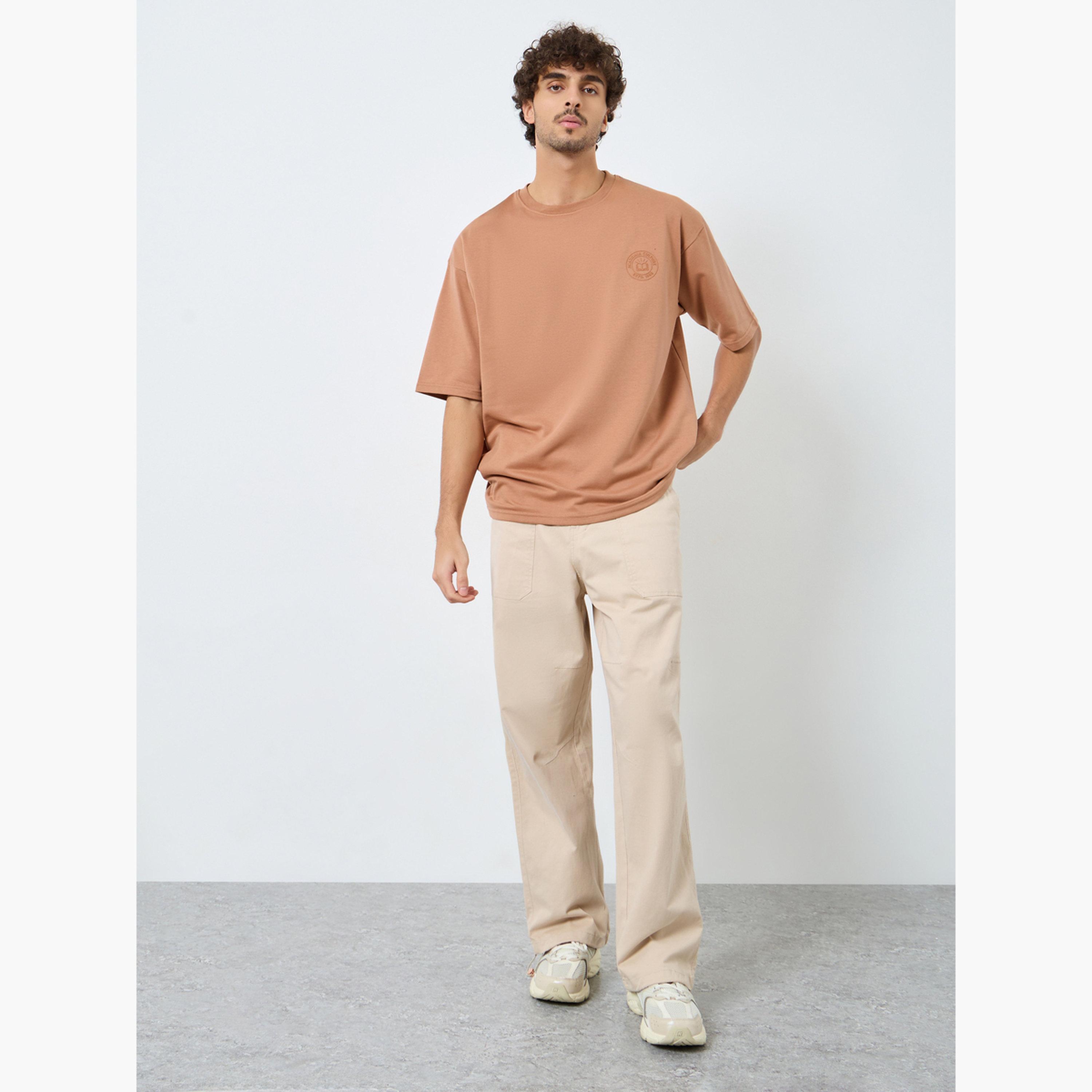 تيشيرت بطبعة جرافيك وقصة واسعة للرجال-men-clothing-tshirtsandpolos-tshirts-image-2