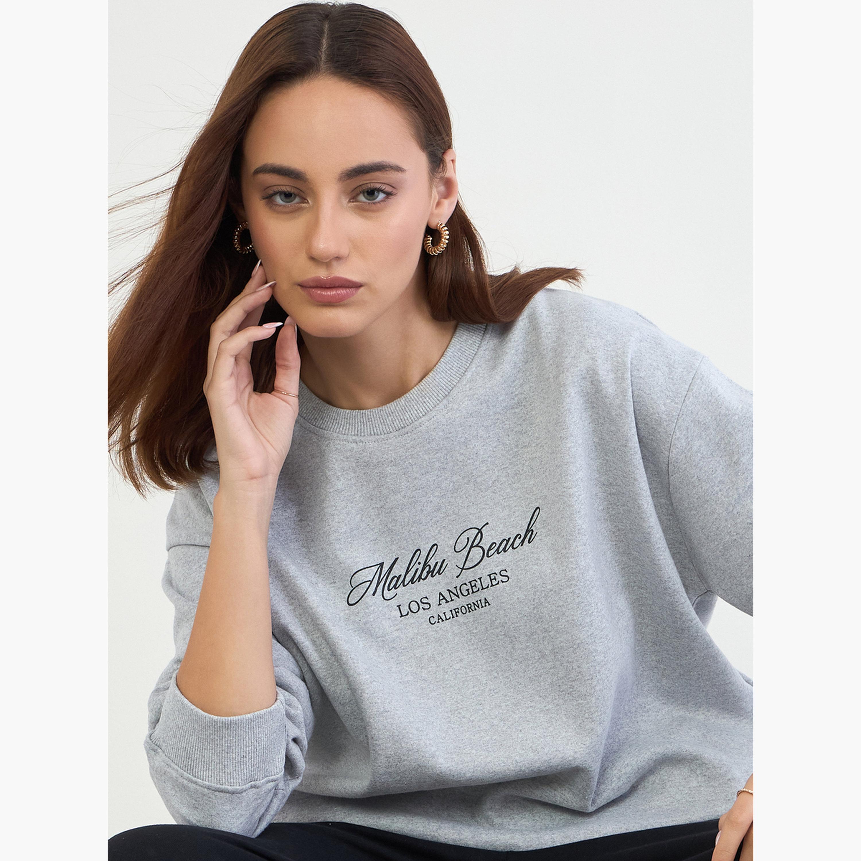 ستايلي - قميص رياضي مطبوع طويل مع بنطال رياضي واسع الساق-women-clothing-coordsets-image-3