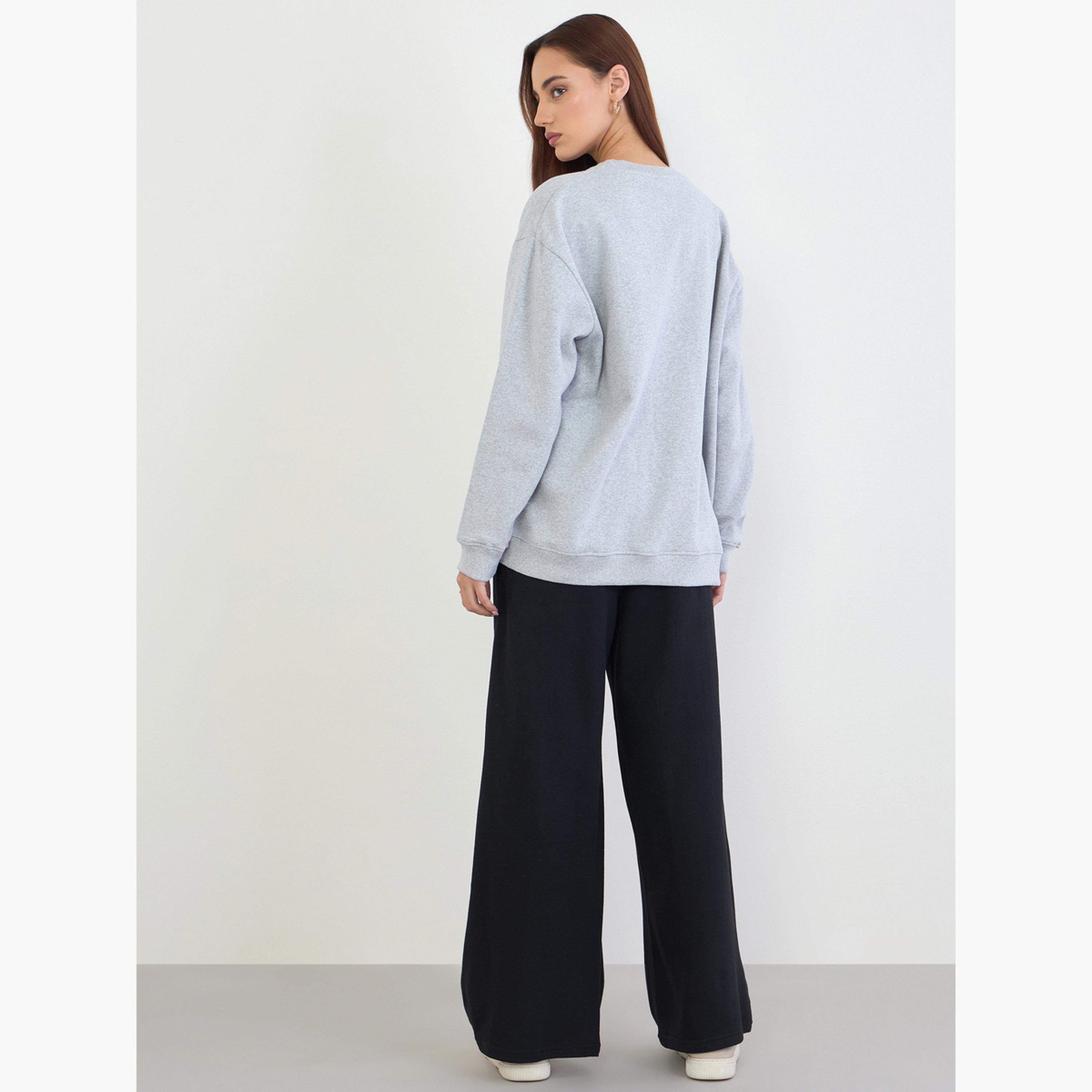ستايلي - قميص رياضي مطبوع طويل مع بنطال رياضي واسع الساق-women-clothing-coordsets-image-5