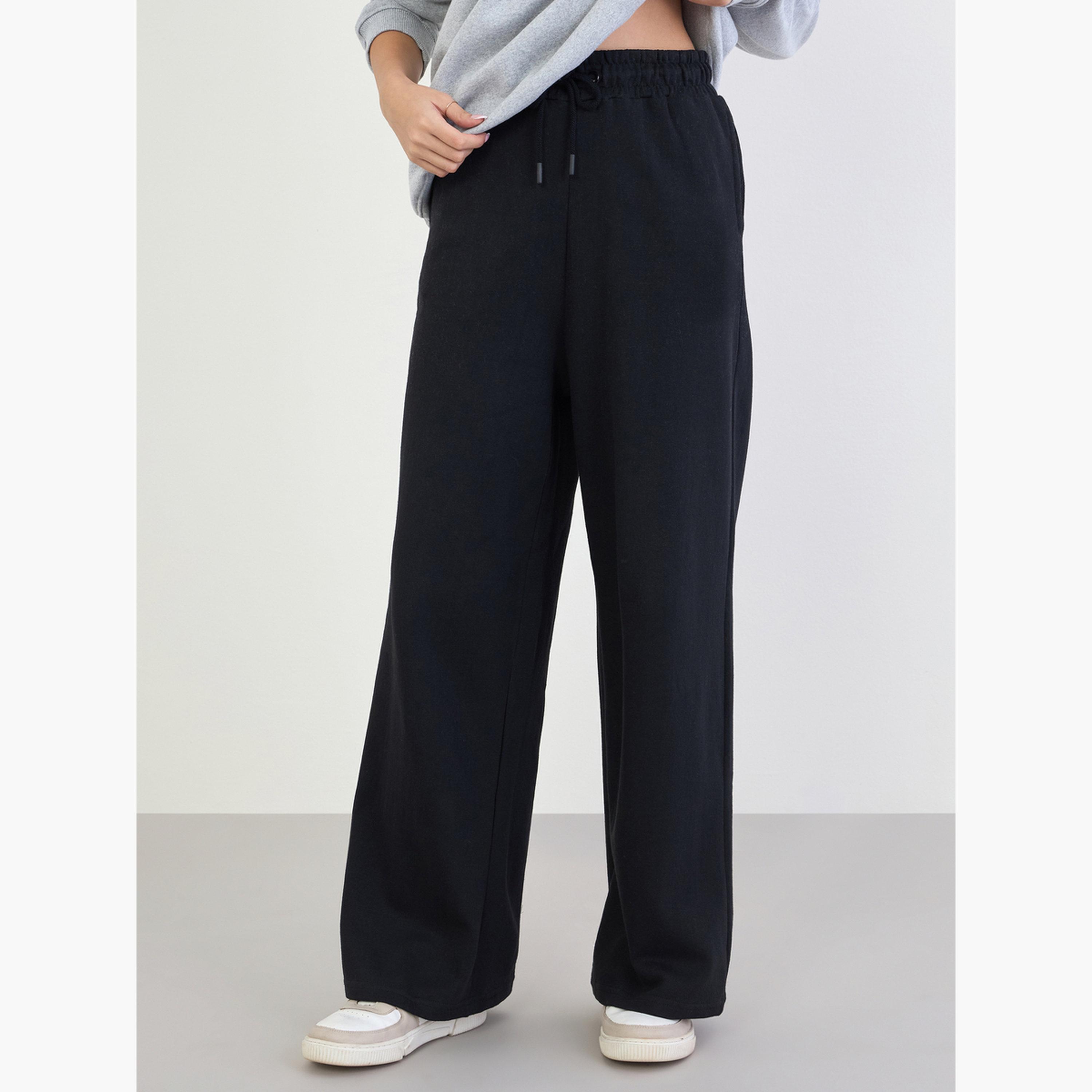 ستايلي - قميص رياضي مطبوع طويل مع بنطال رياضي واسع الساق-women-clothing-coordsets-image-6