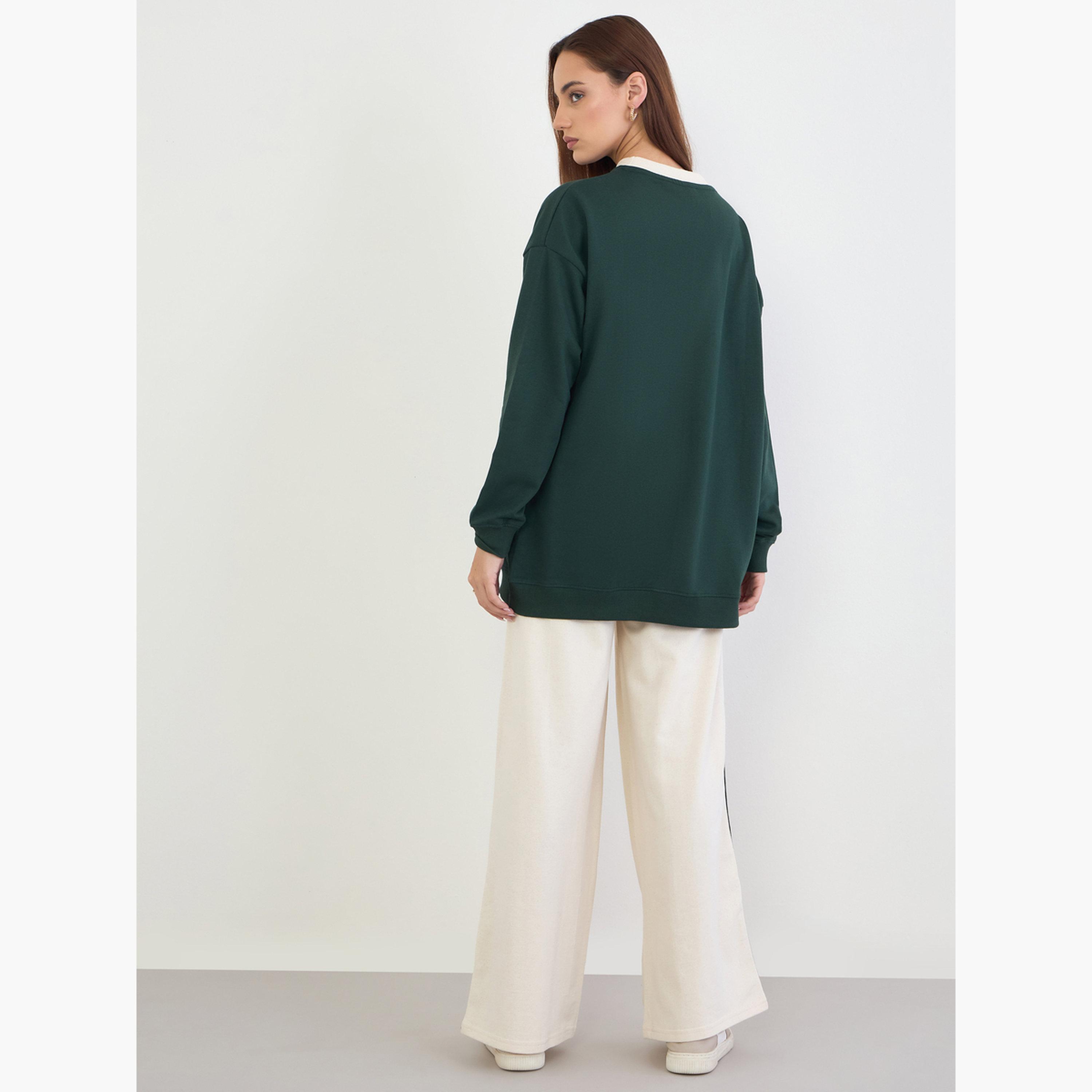 ستايلي - قميص رياضي طويل واسع الحجم مع بنطال رياضي واسع الساق-women-clothing-coordsets-image-3