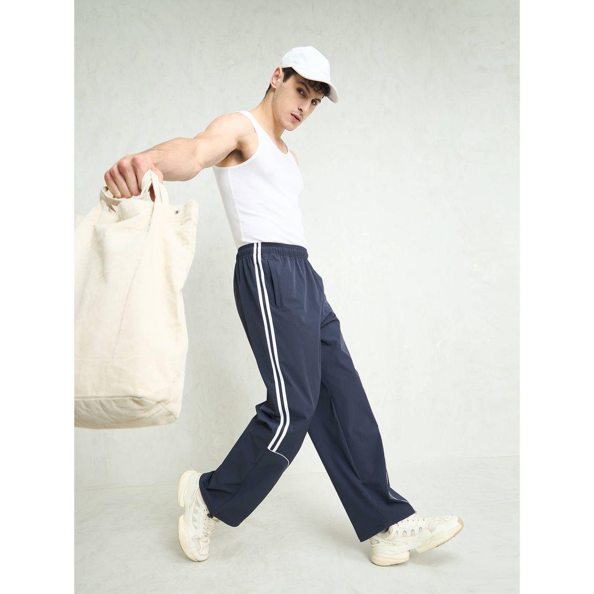 بنطال باراشوت باجي بتفاصيل أنبوبية-men-clothing-bottoms-trousersandchinos-trousers-image-2