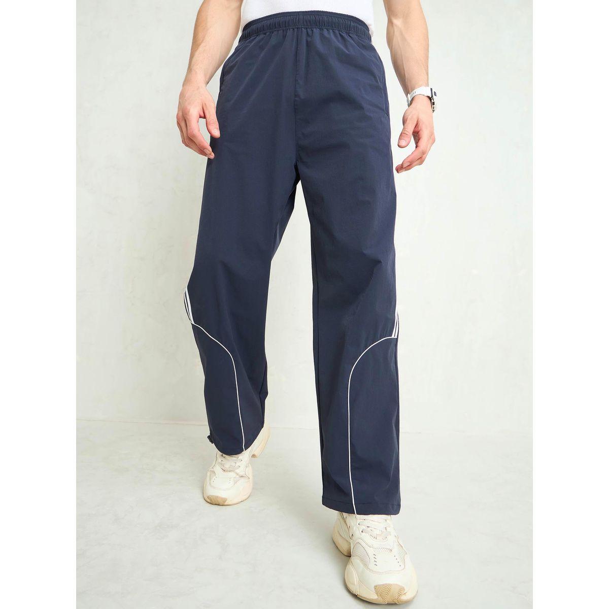 بنطال باراشوت باجي بتفاصيل أنبوبية-men-clothing-bottoms-trousersandchinos-trousers-image-7