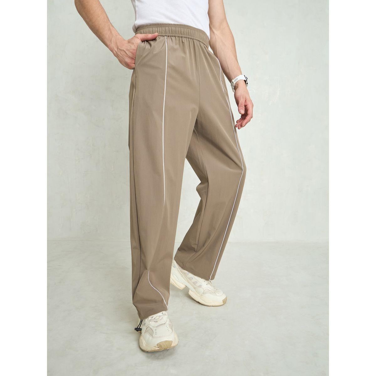 بنطال باراشوت باجي بتفاصيل أنبوبية-men-clothing-bottoms-trousersandchinos-trousers-image-3