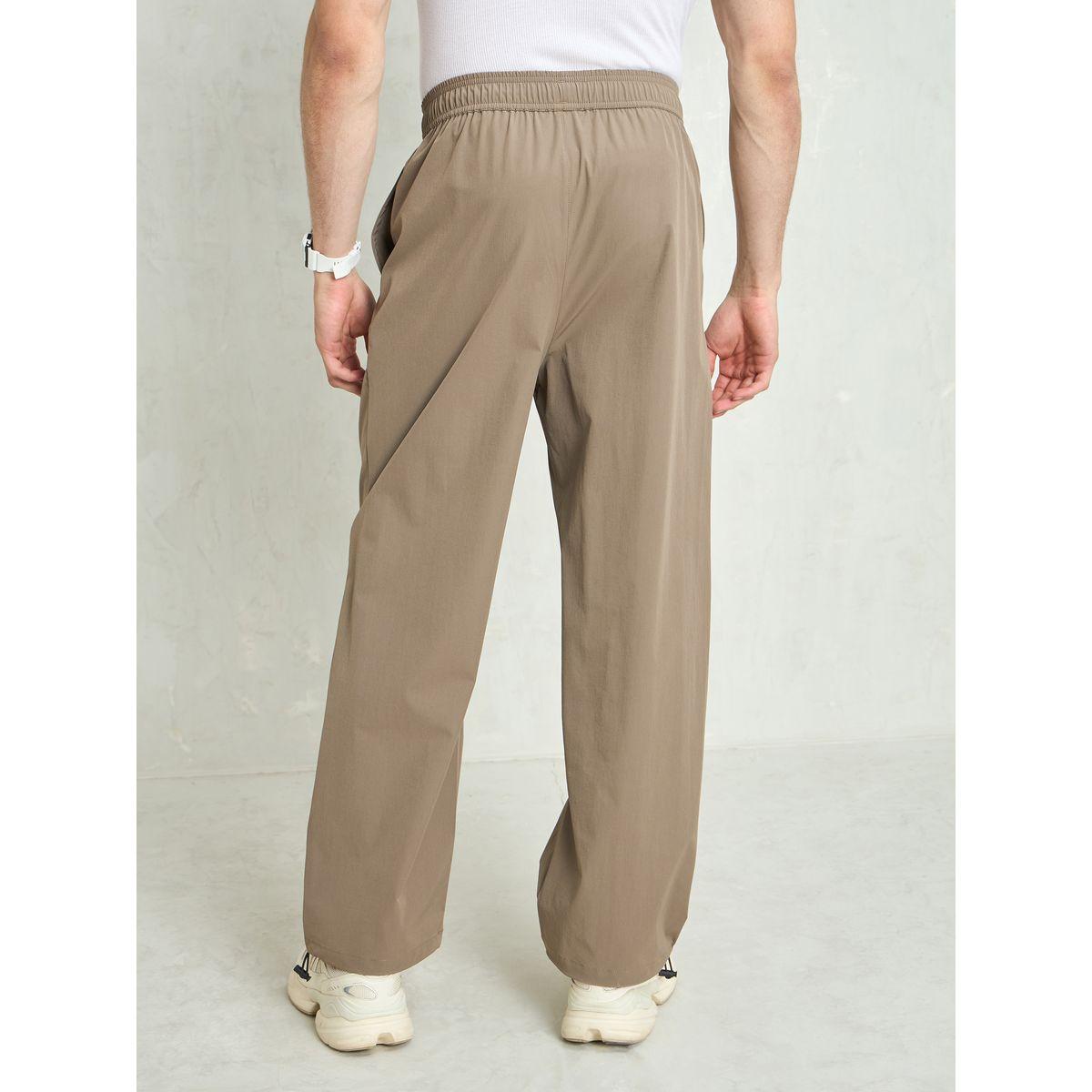 بنطال باراشوت باجي بتفاصيل أنبوبية-men-clothing-bottoms-trousersandchinos-trousers-image-5