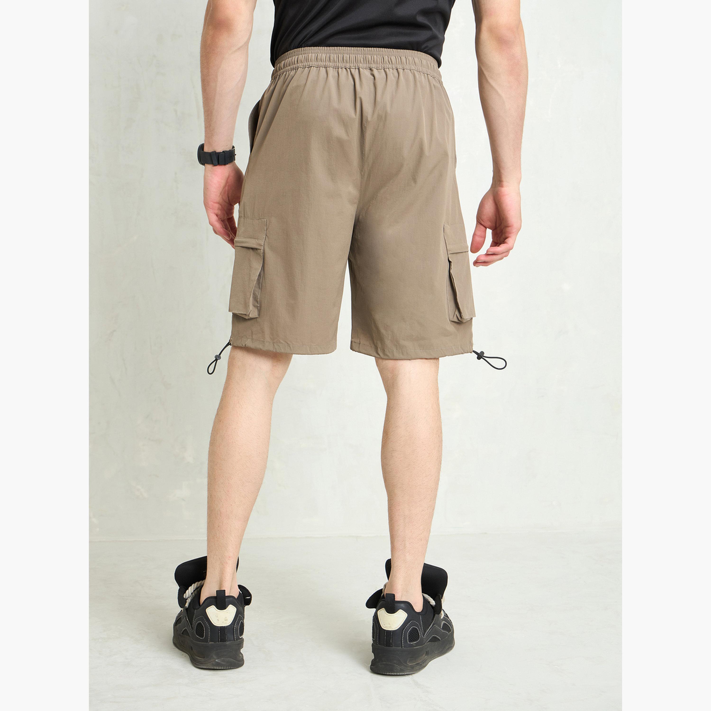 ساسافراس - شورت باراشوت بجيوب شحن لون بيج-men-clothing-bottoms-shorts-image-6