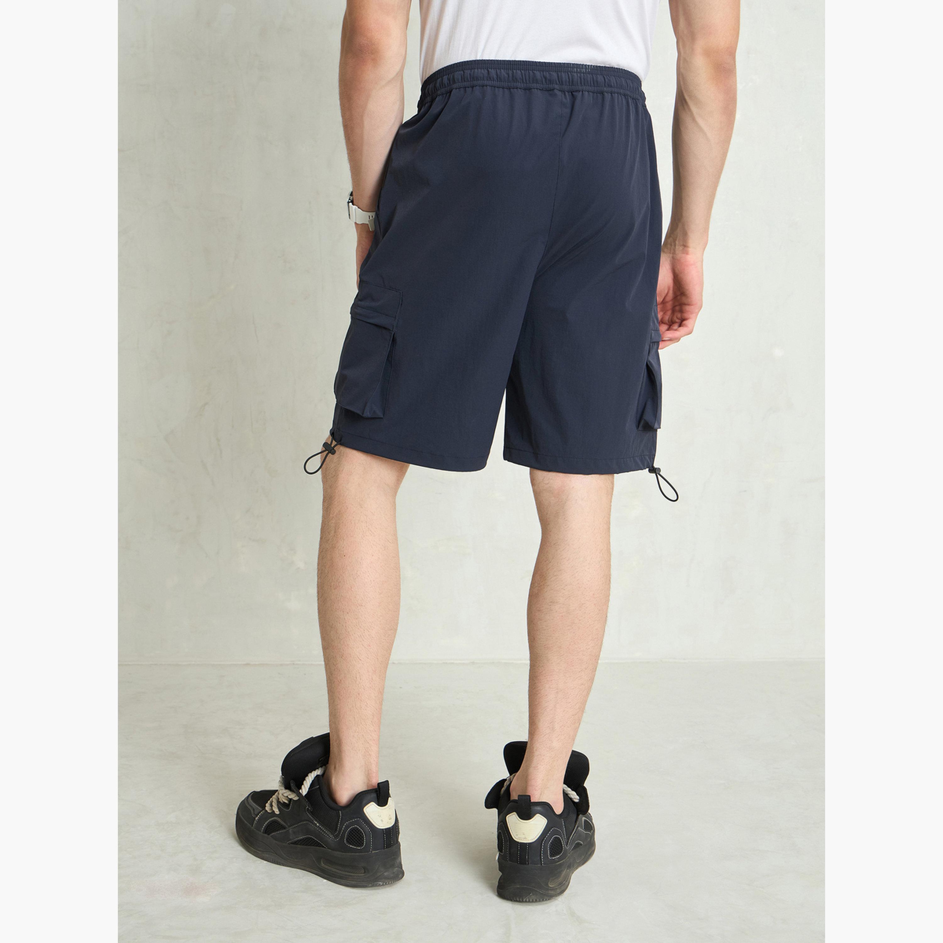 ساسافراس - شورت باراشوت أزرق داكن بجيوب-men-clothing-bottoms-shorts-image-5