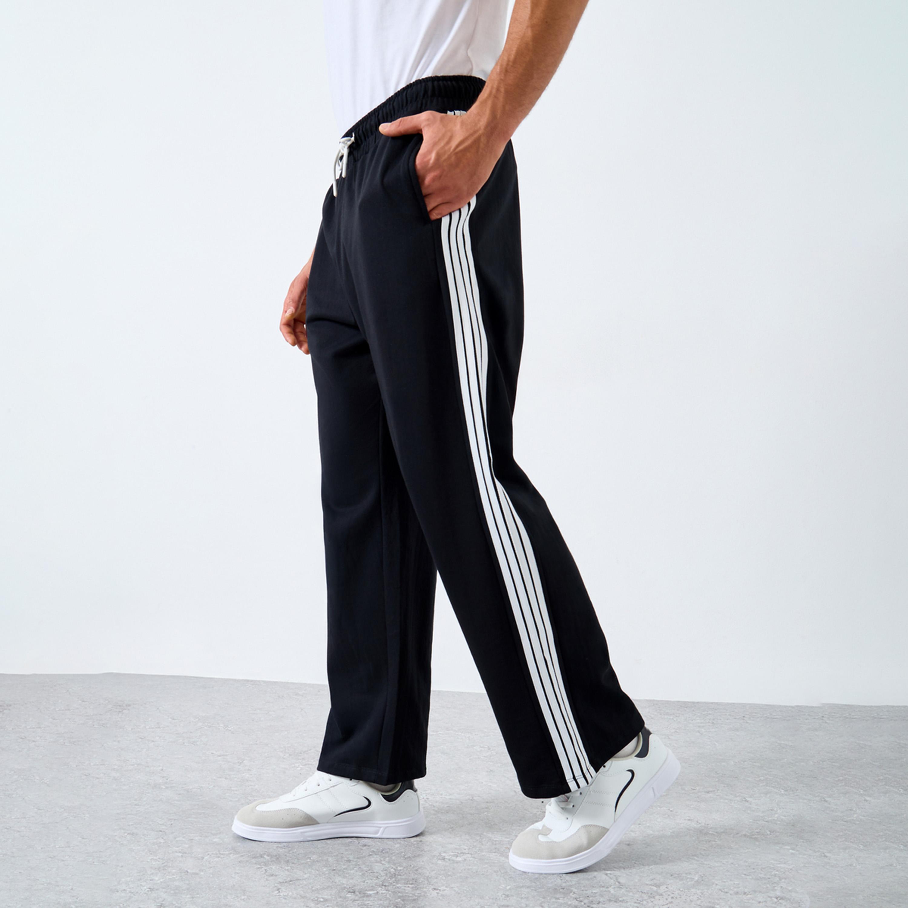 ستايلي - بنطال رياضي من الصوف بشريط جانبي حجم كبير-men-clothing-bottoms-joggers-image-1