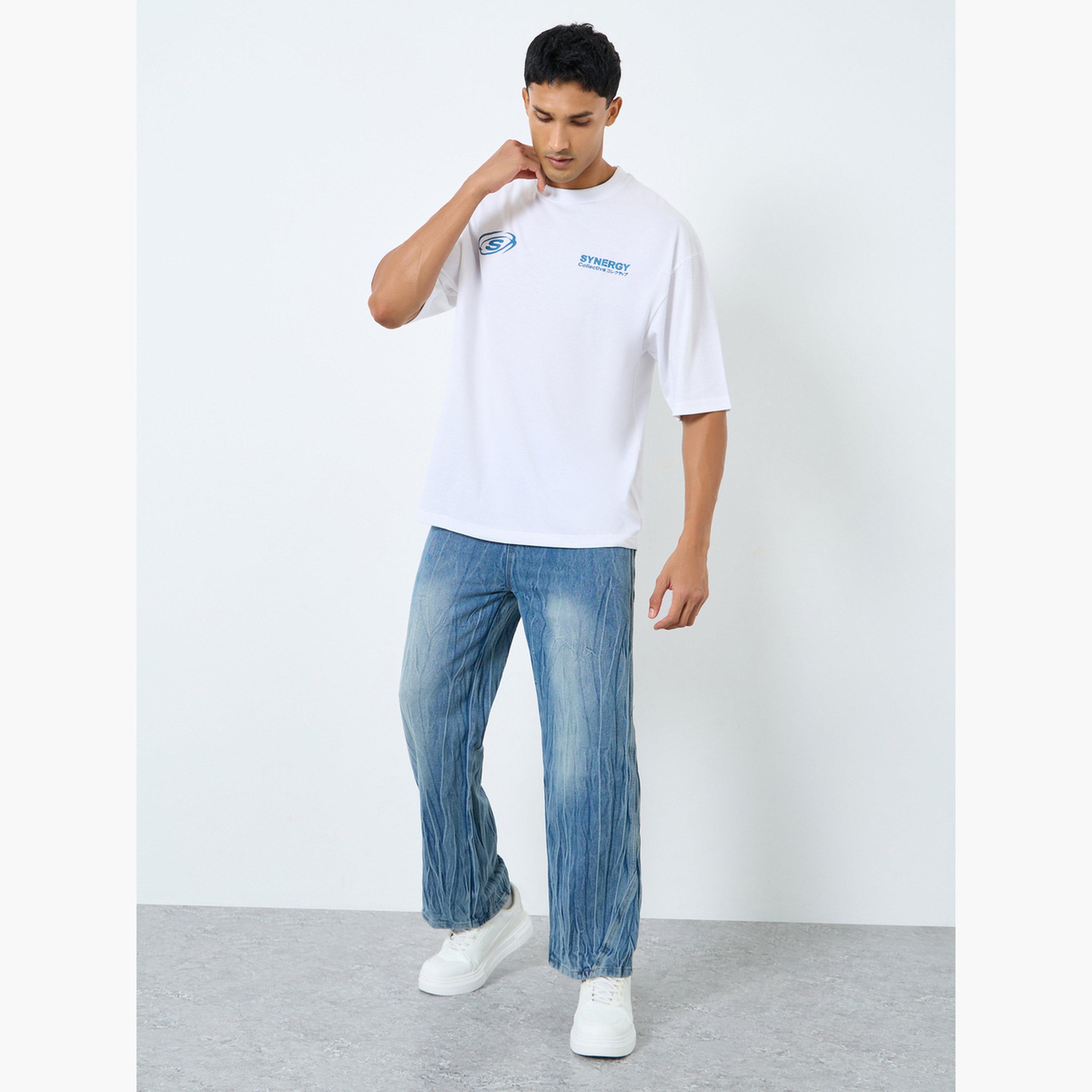 ستايلي - تي شيرت رجالي أبيض بقصّة مربعة وطبعة جرافيكية-men-clothing-tshirtsandpolos-tshirts-image-2