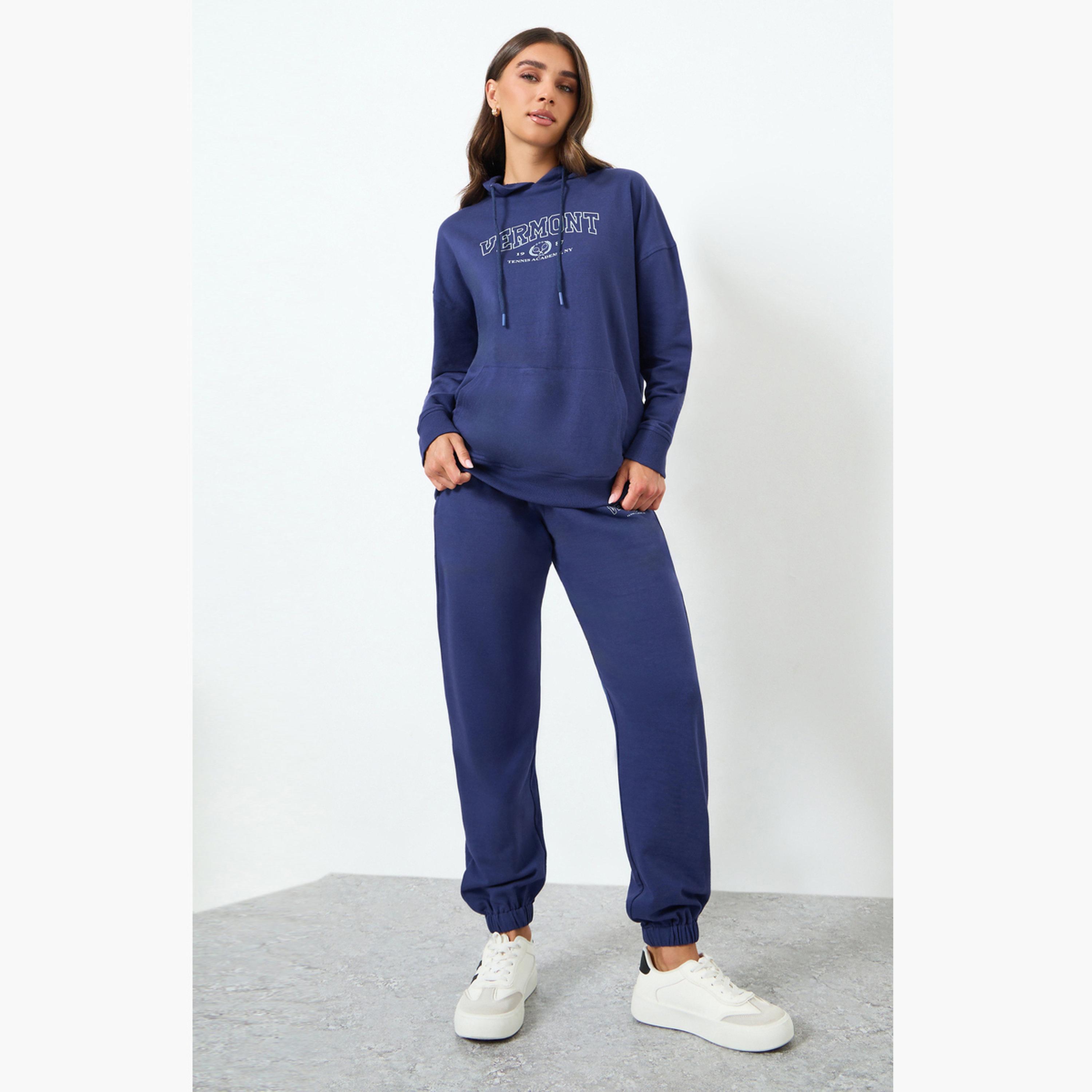 طقم منسق من بنطال بأرجل واسعة وهودي بطبعة جرافيك-women-clothing-coordsets-image-1