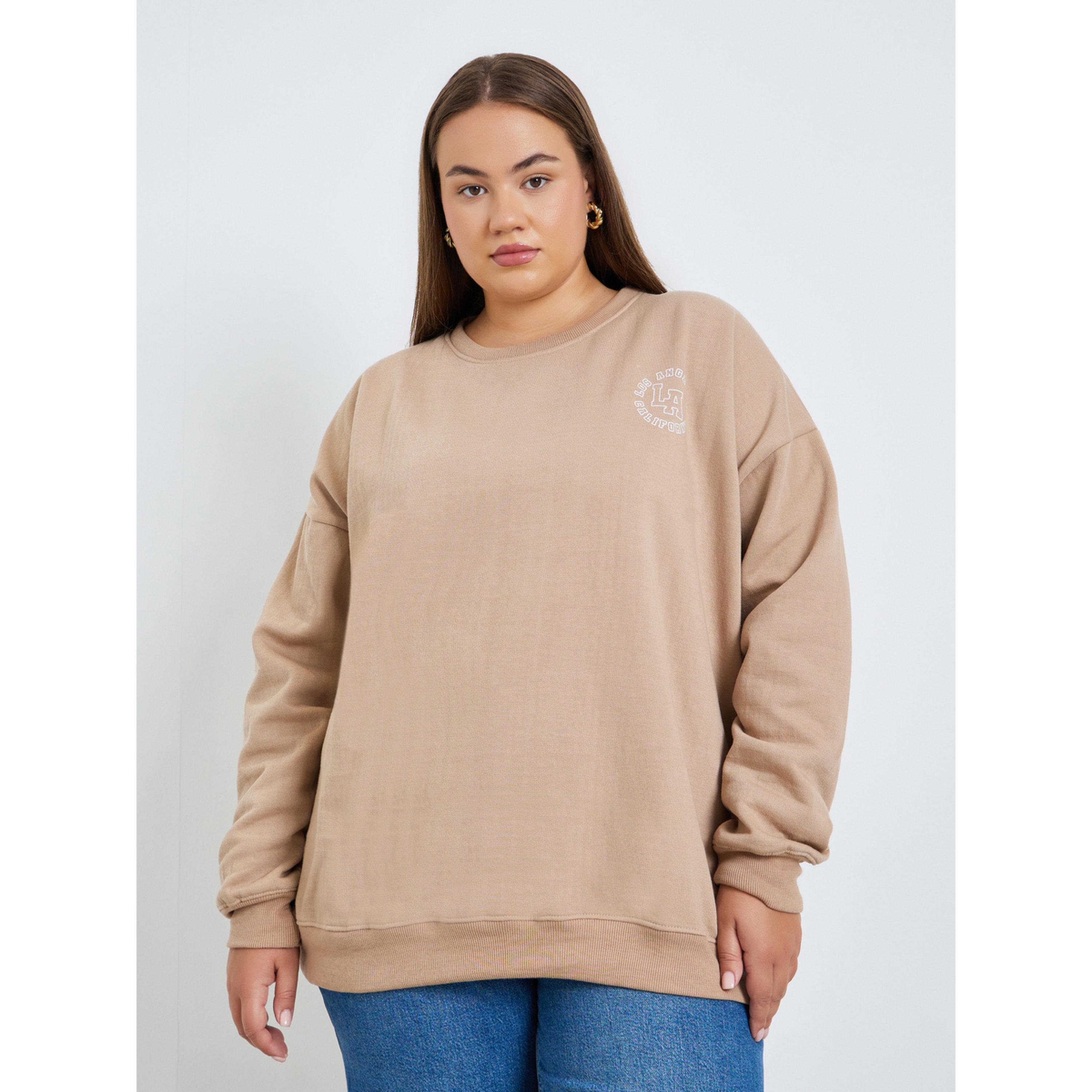 سويت شيرت واسع بمقاس كبير وطبعة جرافيك-women-winterwear-hoodiesandsweatshirts-sweatshirts-image-1