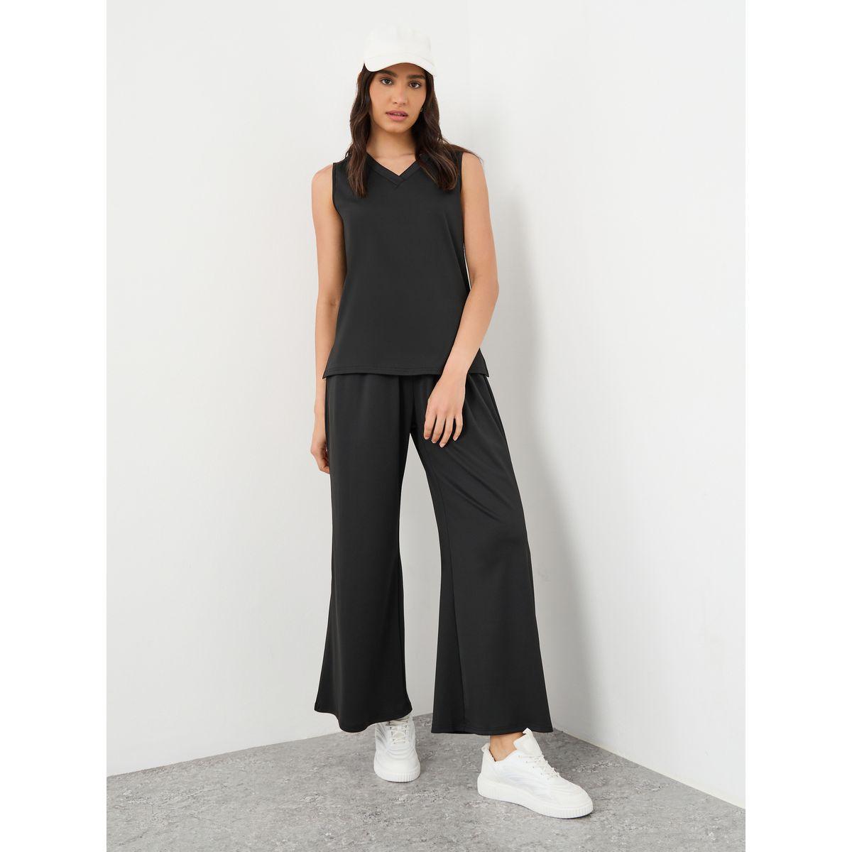 طقم منسق من بنطال وبلوزة بدون أكمام-women-clothing-coordsets-image-1