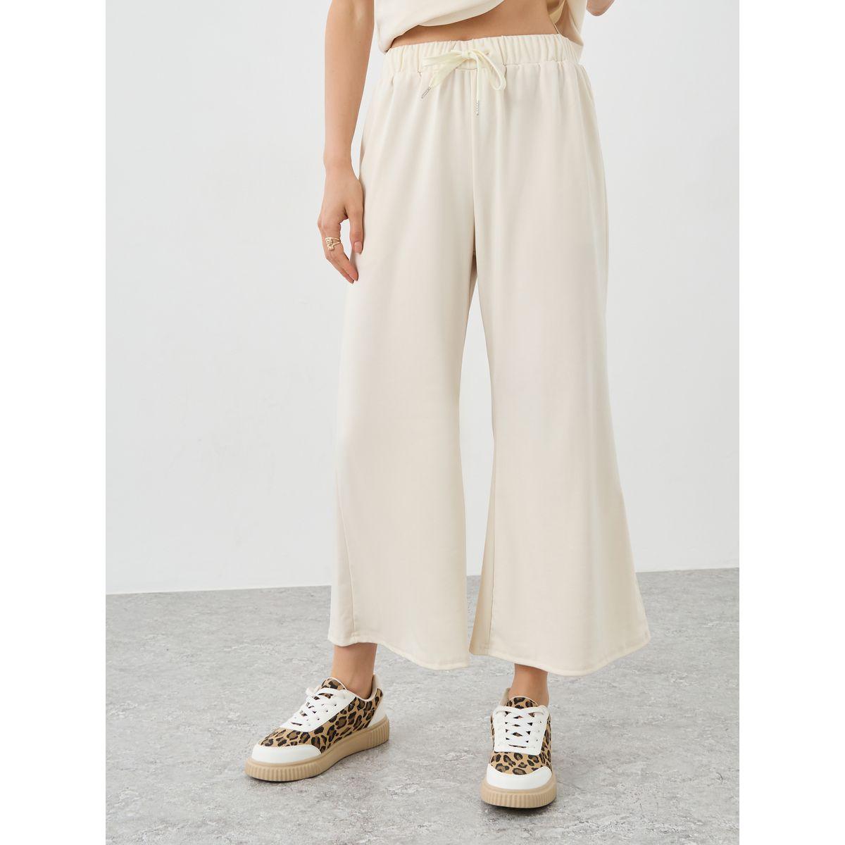 طقم منسق من بنطال وبلوزة بدون أكمام-women-clothing-coordsets-image-6