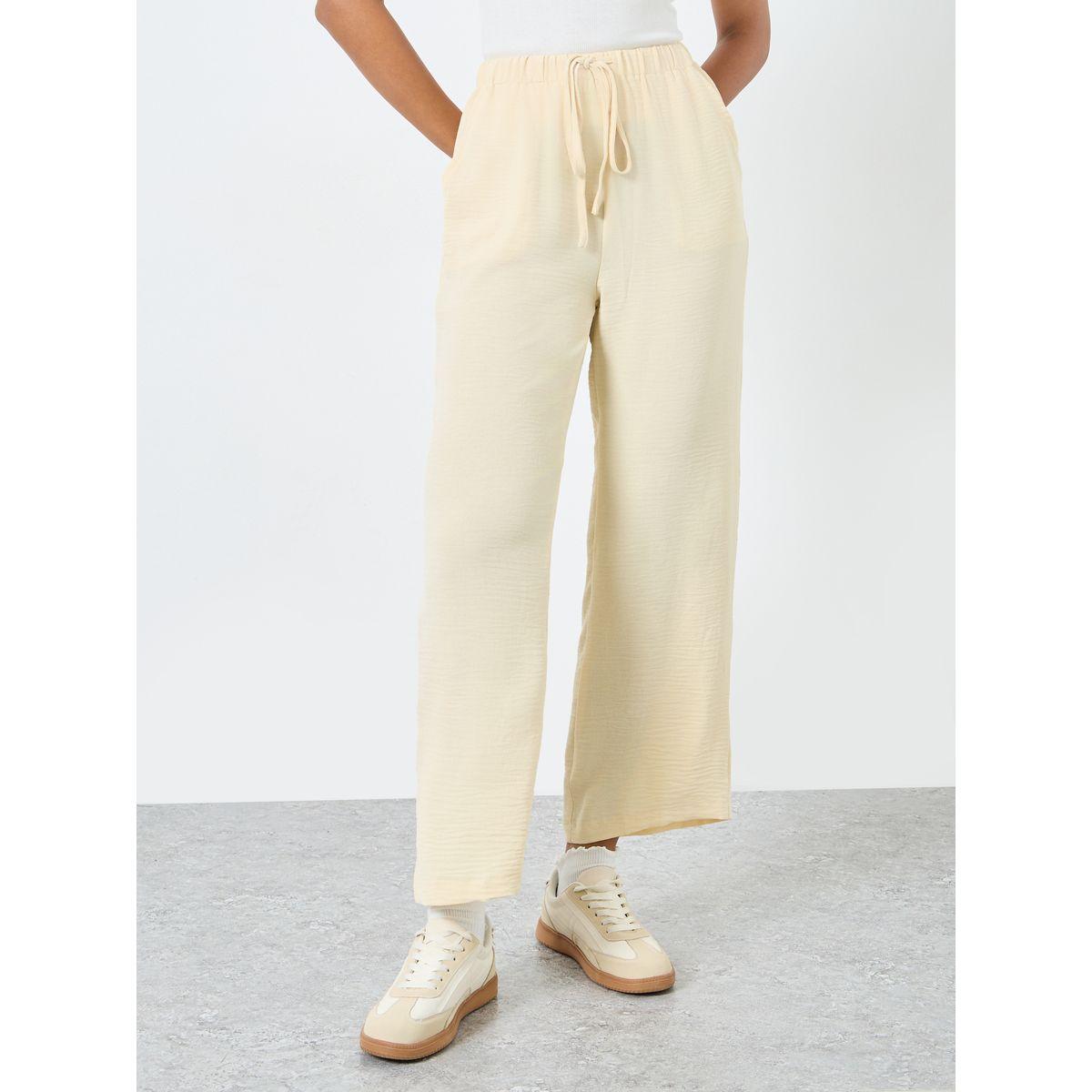 بنطال سادة بقصة أرجل واسعة مع أربطة خصر-women-clothing-bottoms-trousers-image-2