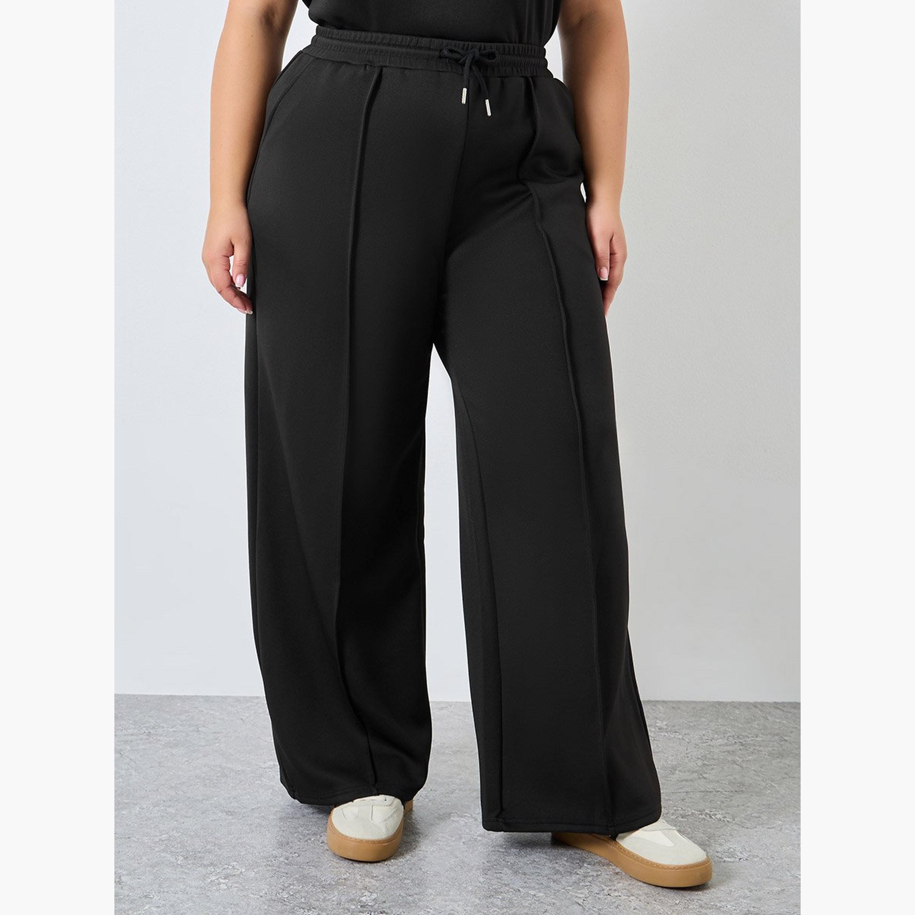 ستايلي - بنطال رياضي أسود واسع الساق مقاس كبير-women-clothing-bottoms-joggers-image-1