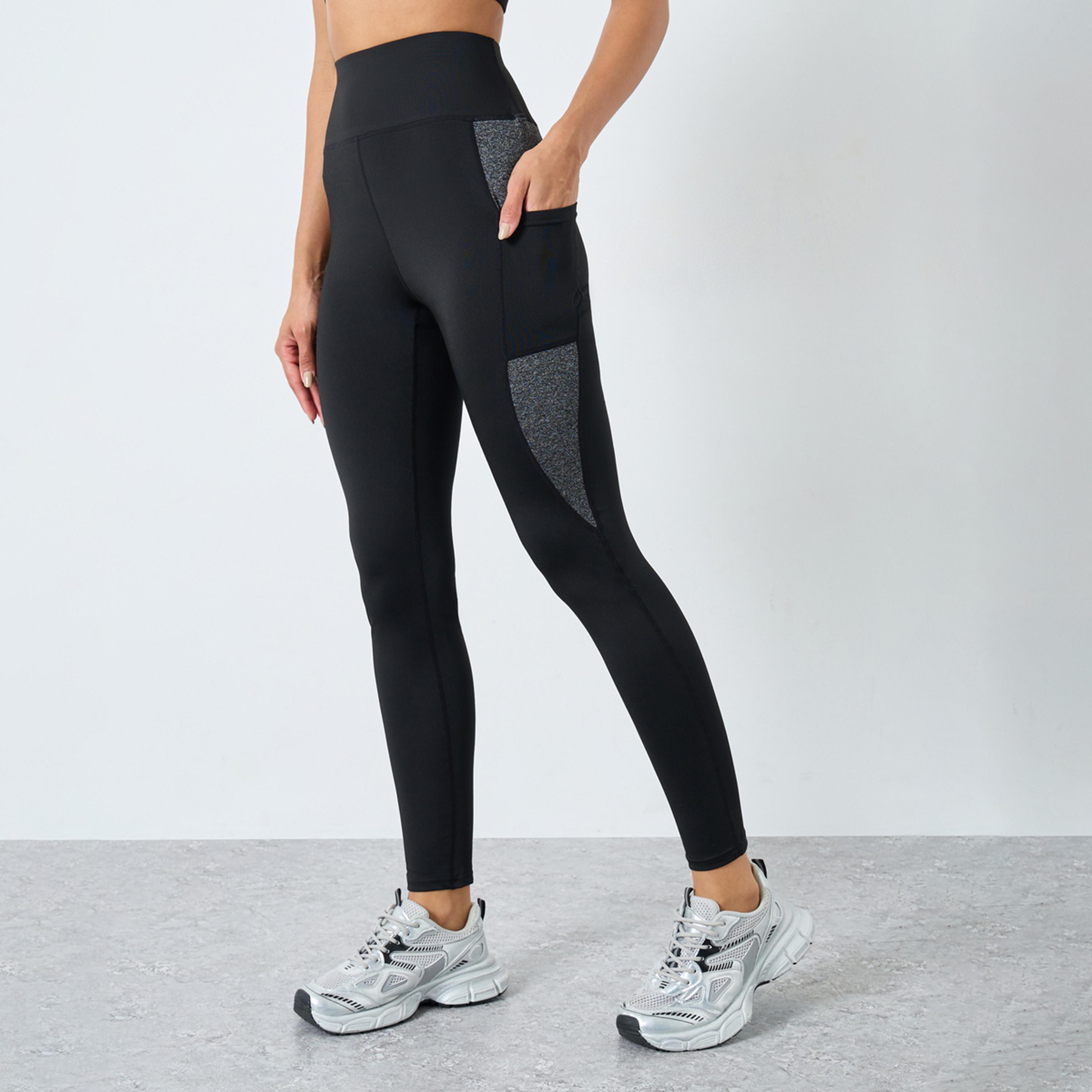 ستايلي - بنطال ضيق بتفاصيل جيوب ولوحة بألوان متباينة-women-clothing-sportswearandactivewear-bottoms-leggings-image-1