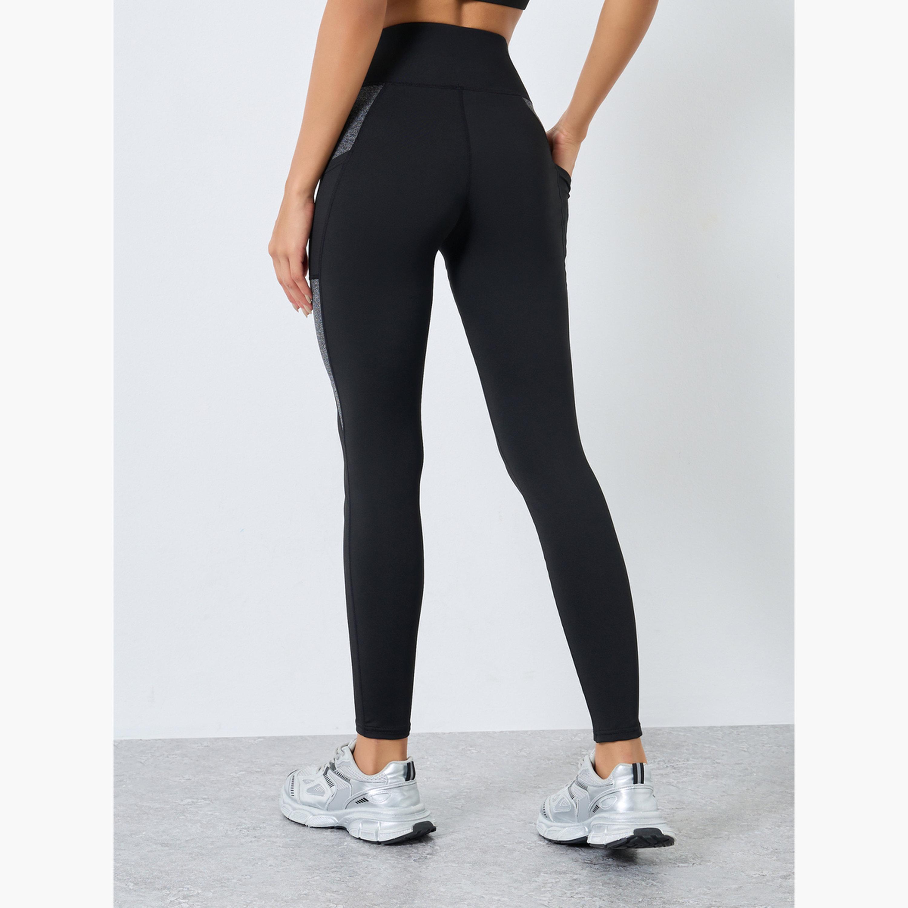 ستايلي - بنطال ضيق بتفاصيل جيوب ولوحة بألوان متباينة-women-clothing-sportswearandactivewear-bottoms-leggings-image-3