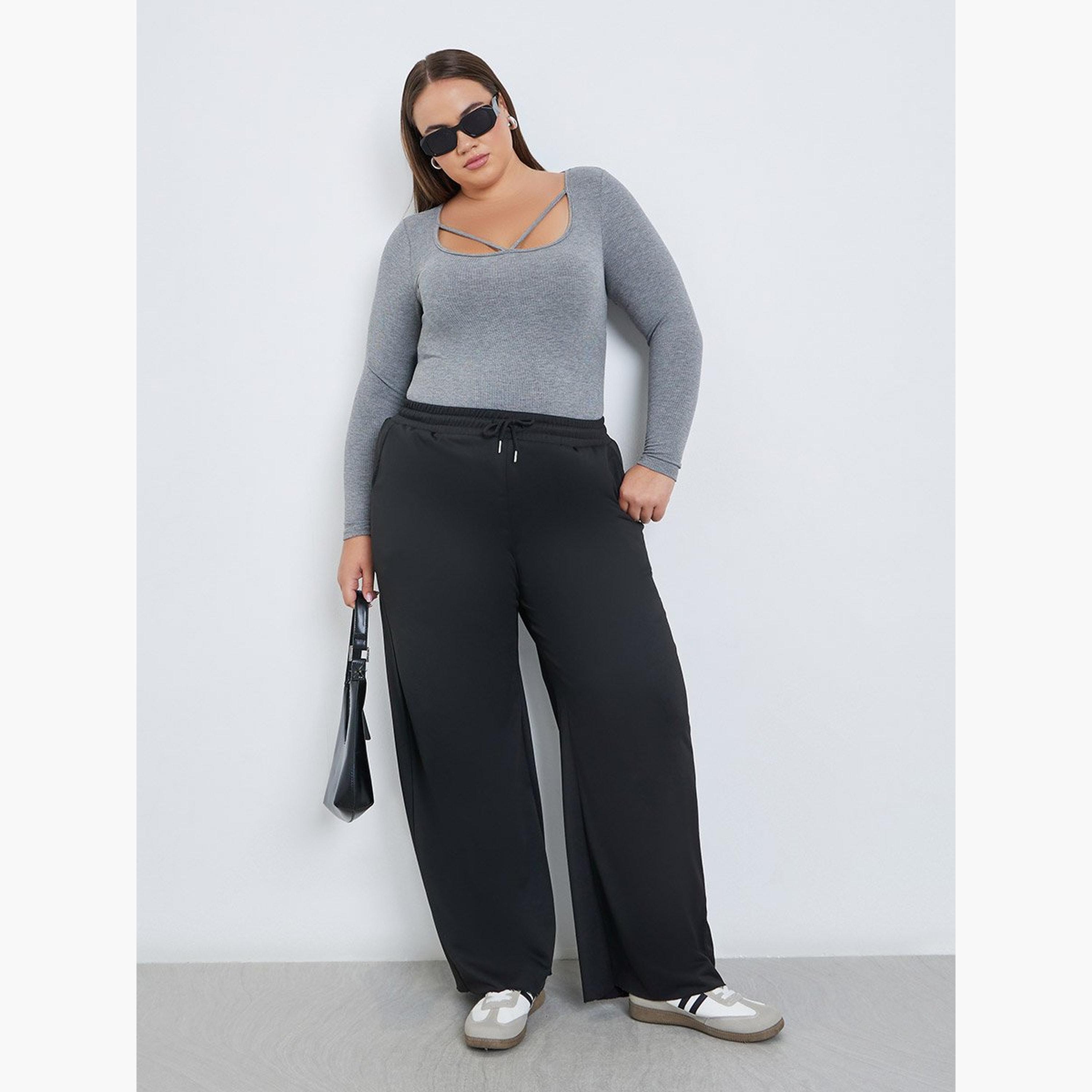 ستايلي - بنطال رياضي أسود واسع الساق مع خصر برباط-women-clothing-bottoms-joggers-image-2