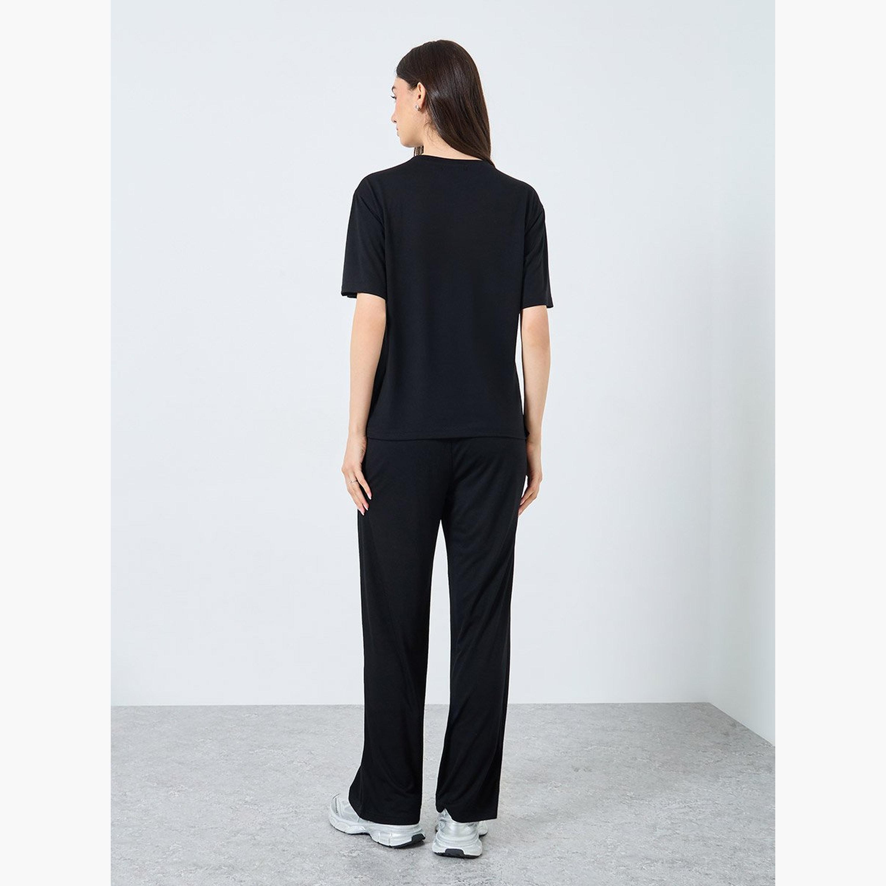 تيك تو - تي شيرت أسود سادة مع بنطال رياضي فضفاض-women-clothing-coordsets-image-4