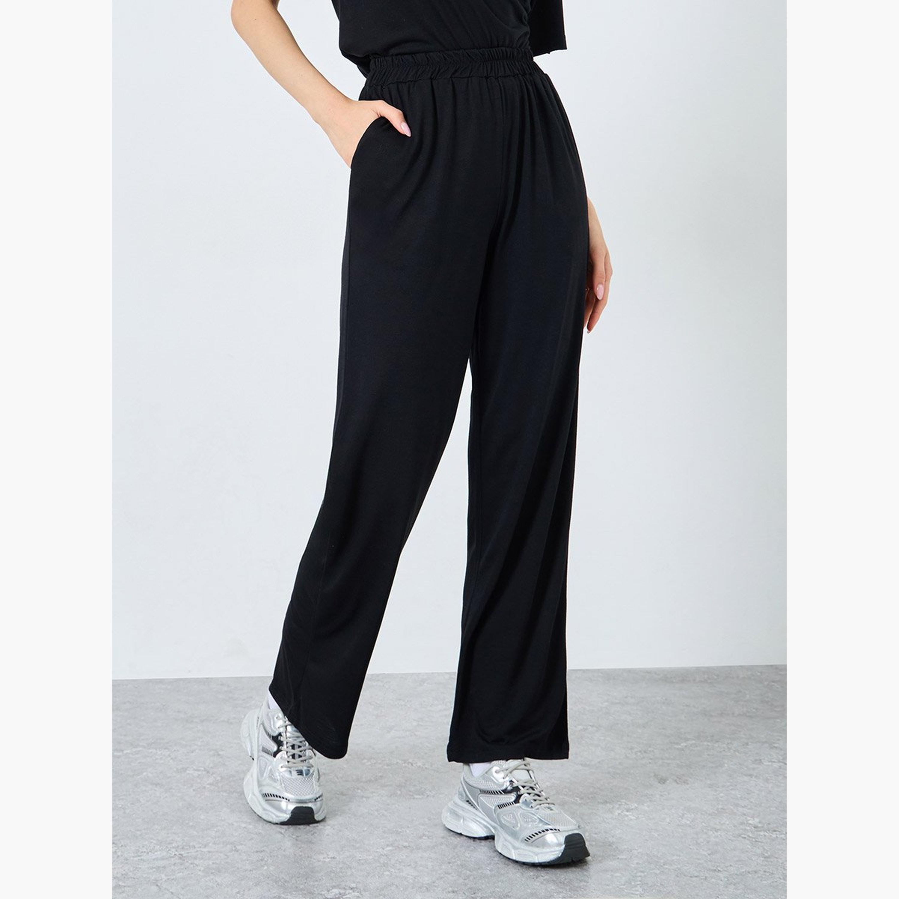 تيك تو - تي شيرت أسود سادة مع بنطال رياضي فضفاض-women-clothing-coordsets-image-5
