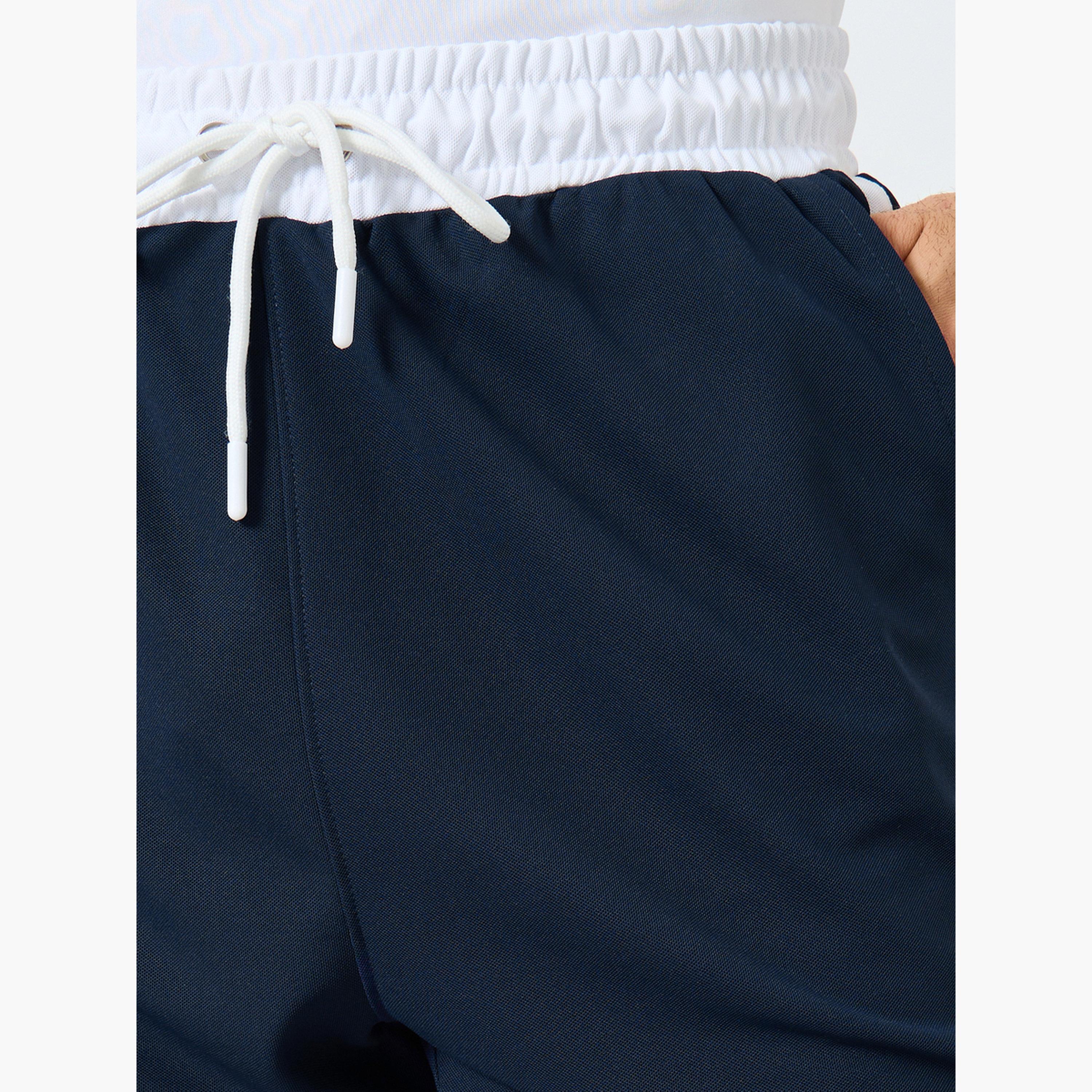 ستايلي - شورت رياضي بحواف متباينة مع جيب للرجال-sports-men-clothing-bottoms-shorts-image-3