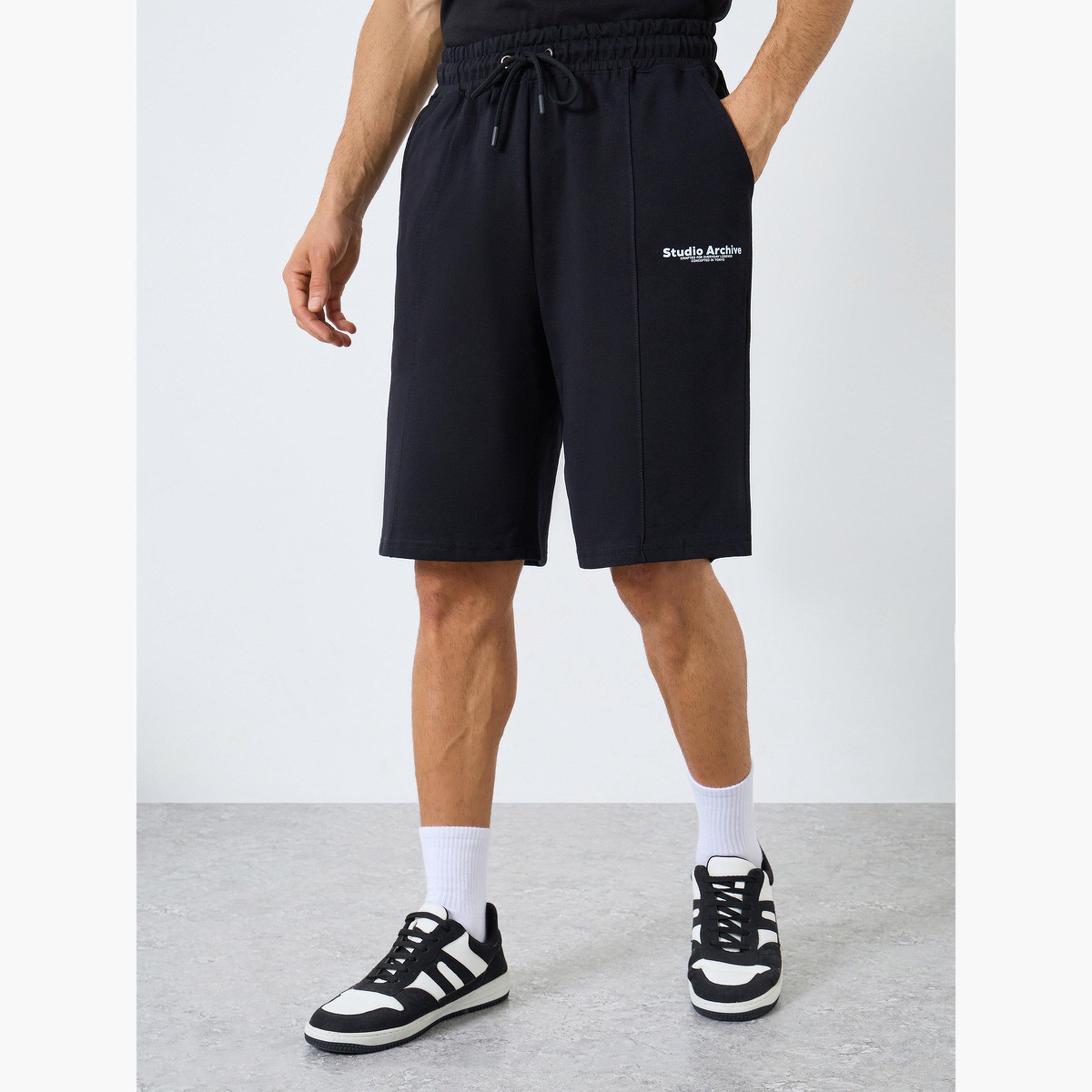 Styli Minimal Print Oversized Terry Shorts-men-clothing-sportswearandactivewear-bottoms-shorts-image-1