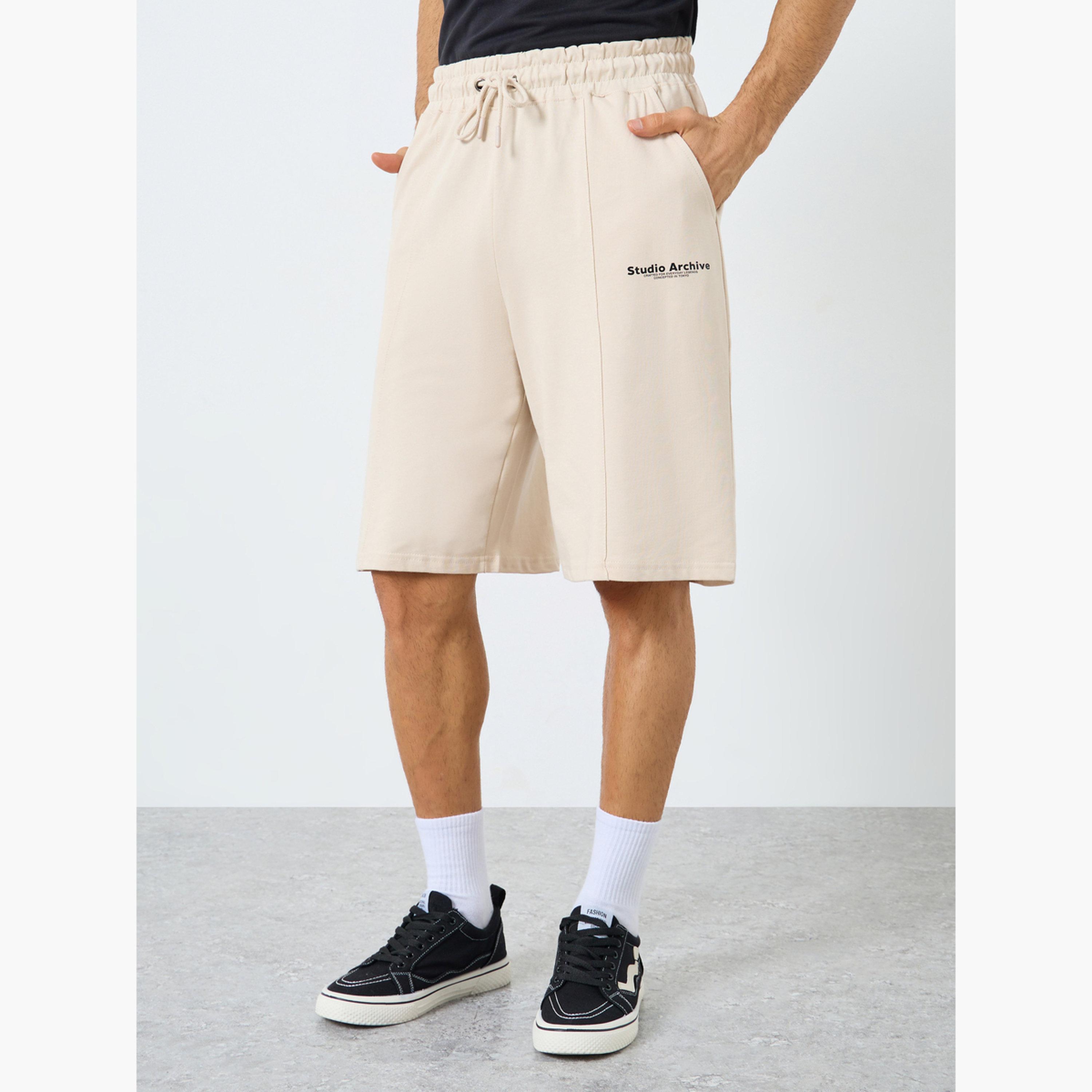 Styli Minimal Print Oversized Terry Shorts-men-clothing-sportswearandactivewear-bottoms-shorts-image-1