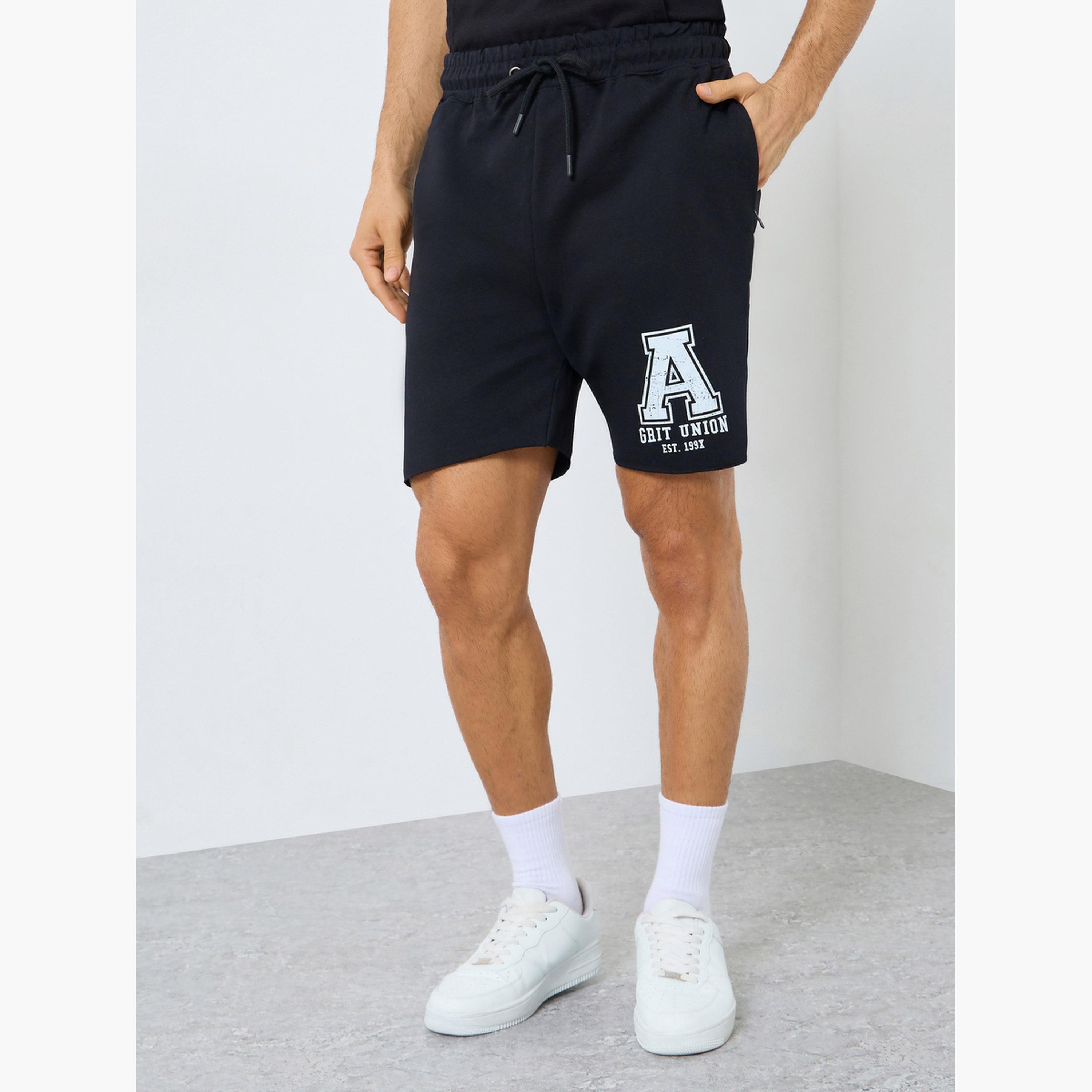 ستايلي - شورت تدريب تيري رو هيم للرجال-men-clothing-sportswearandactivewear-bottoms-shorts-image-1
