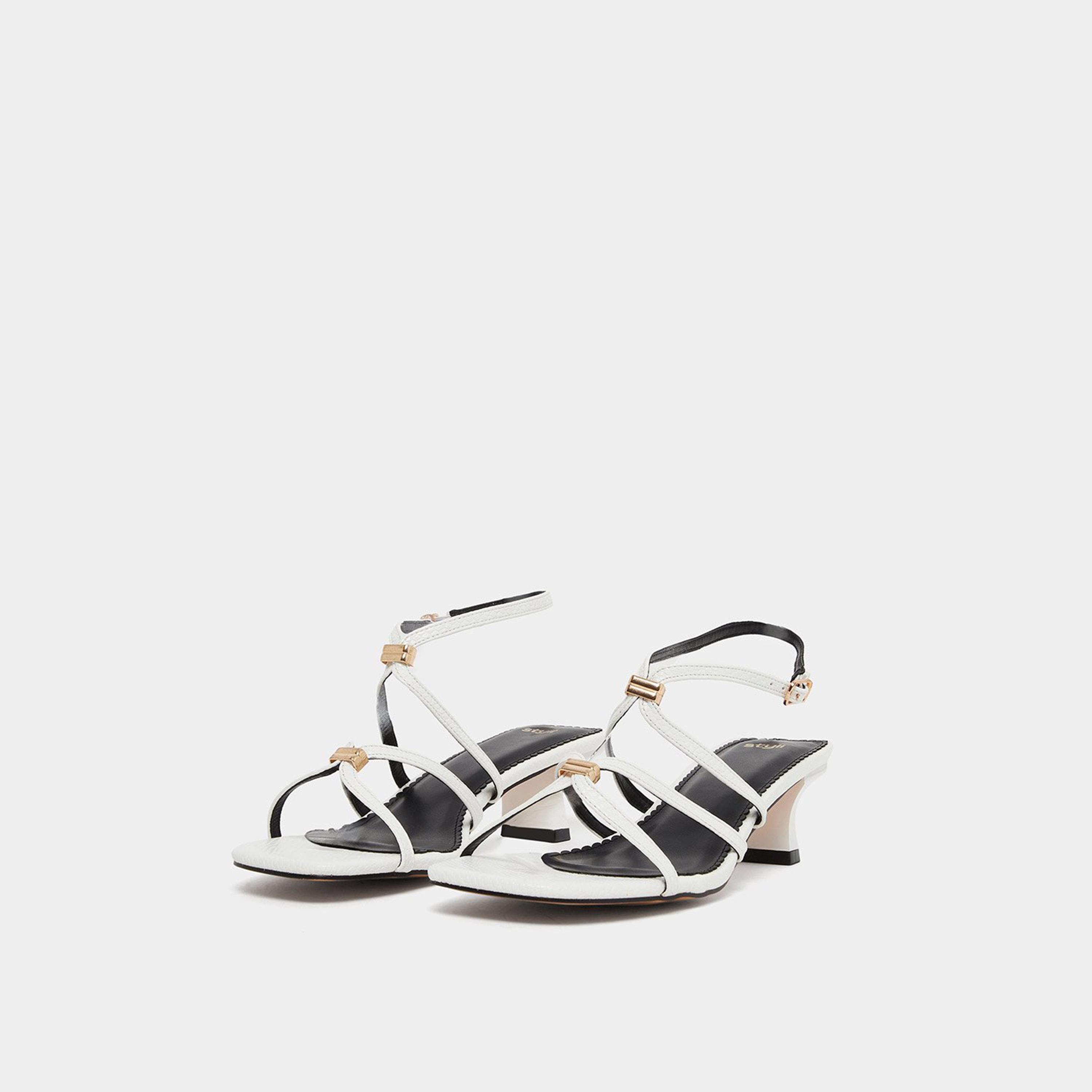 ستايلي - صندل بأشرطة مزين بلمسات معدنية بيضاء-women-shoes-sandals-heeled-image-1