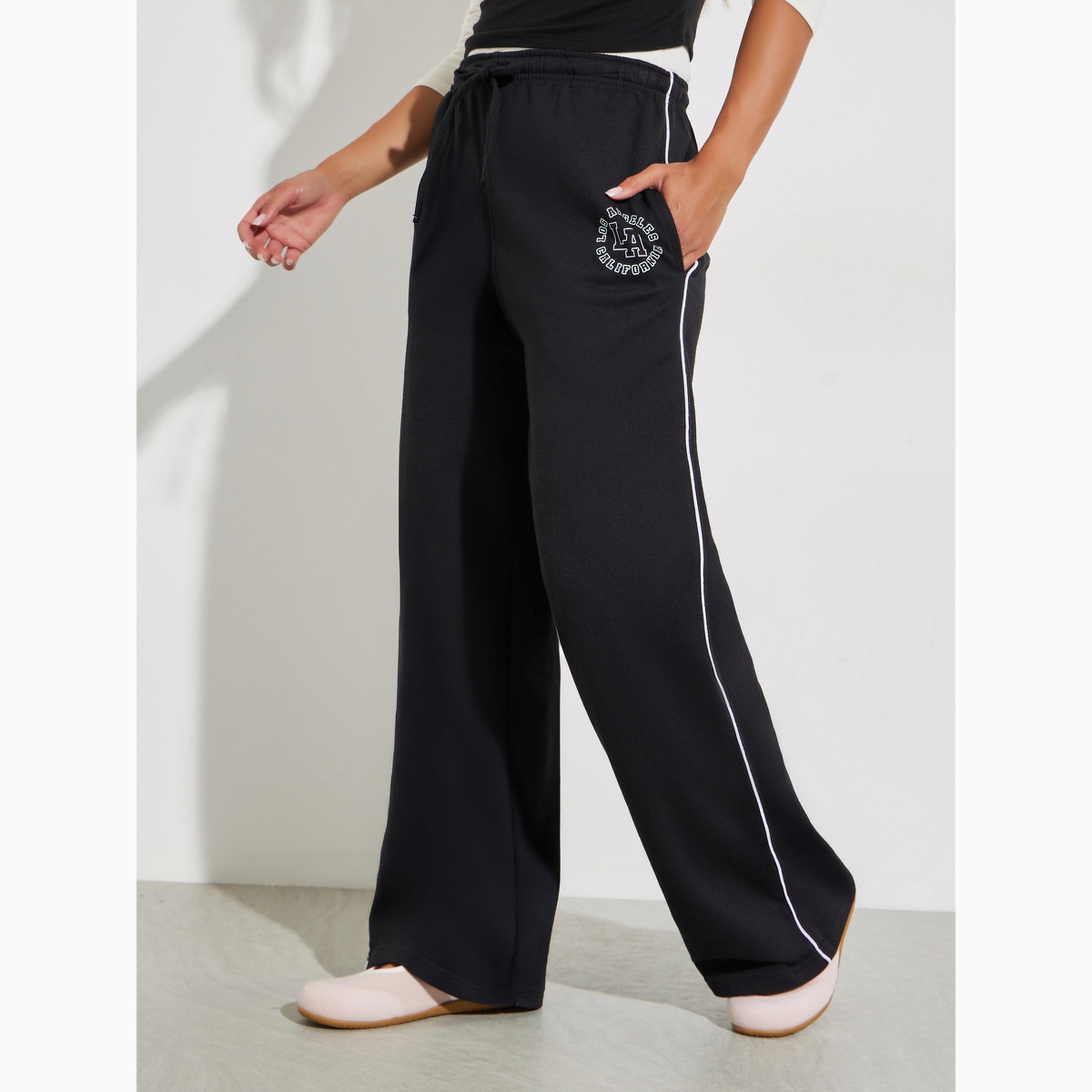 جوغر بأرجل واسعة وتفاصيل خطوط أسود-women-clothing-bottoms-joggers-image-1