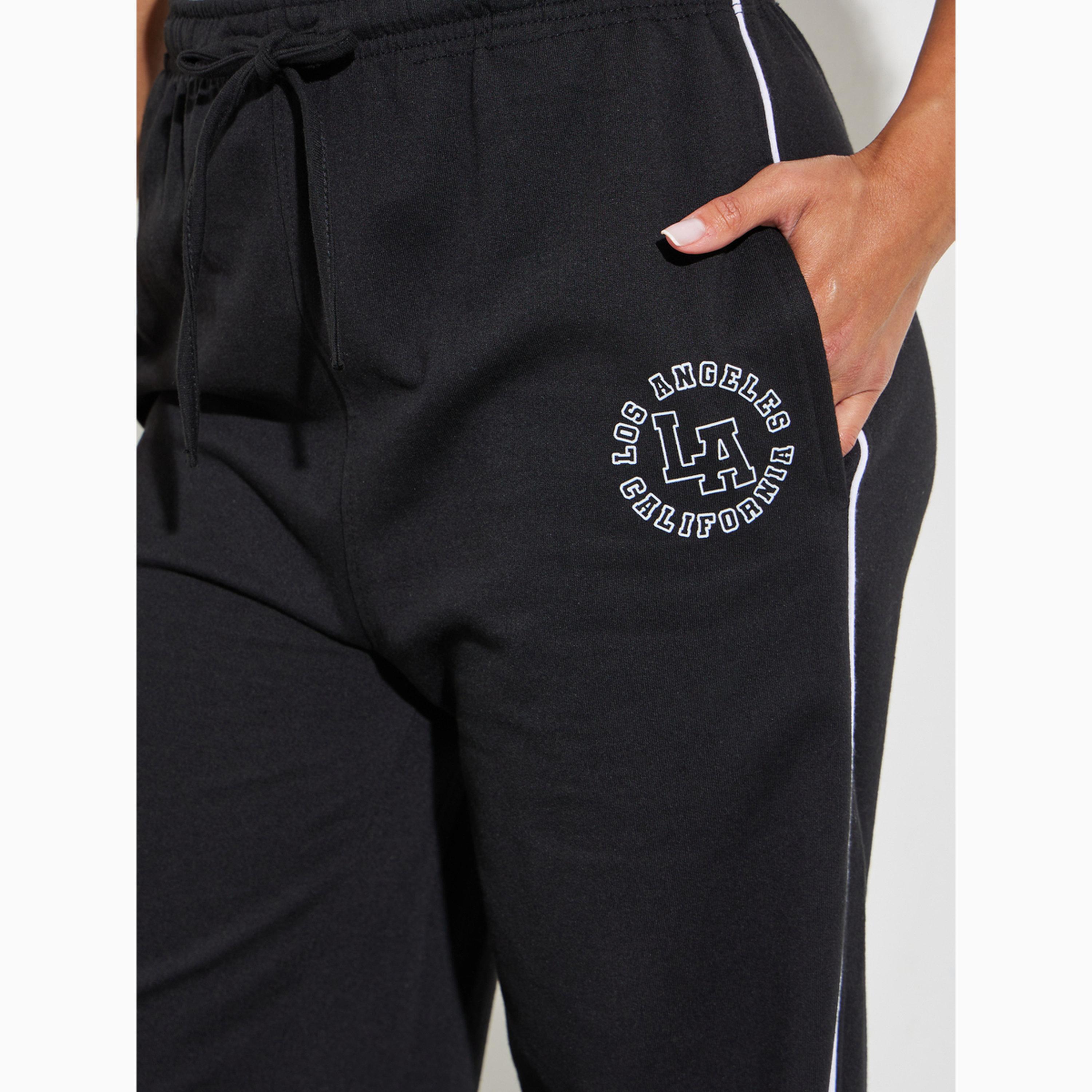 جوغر بأرجل واسعة وتفاصيل خطوط أسود-women-clothing-bottoms-joggers-image-3