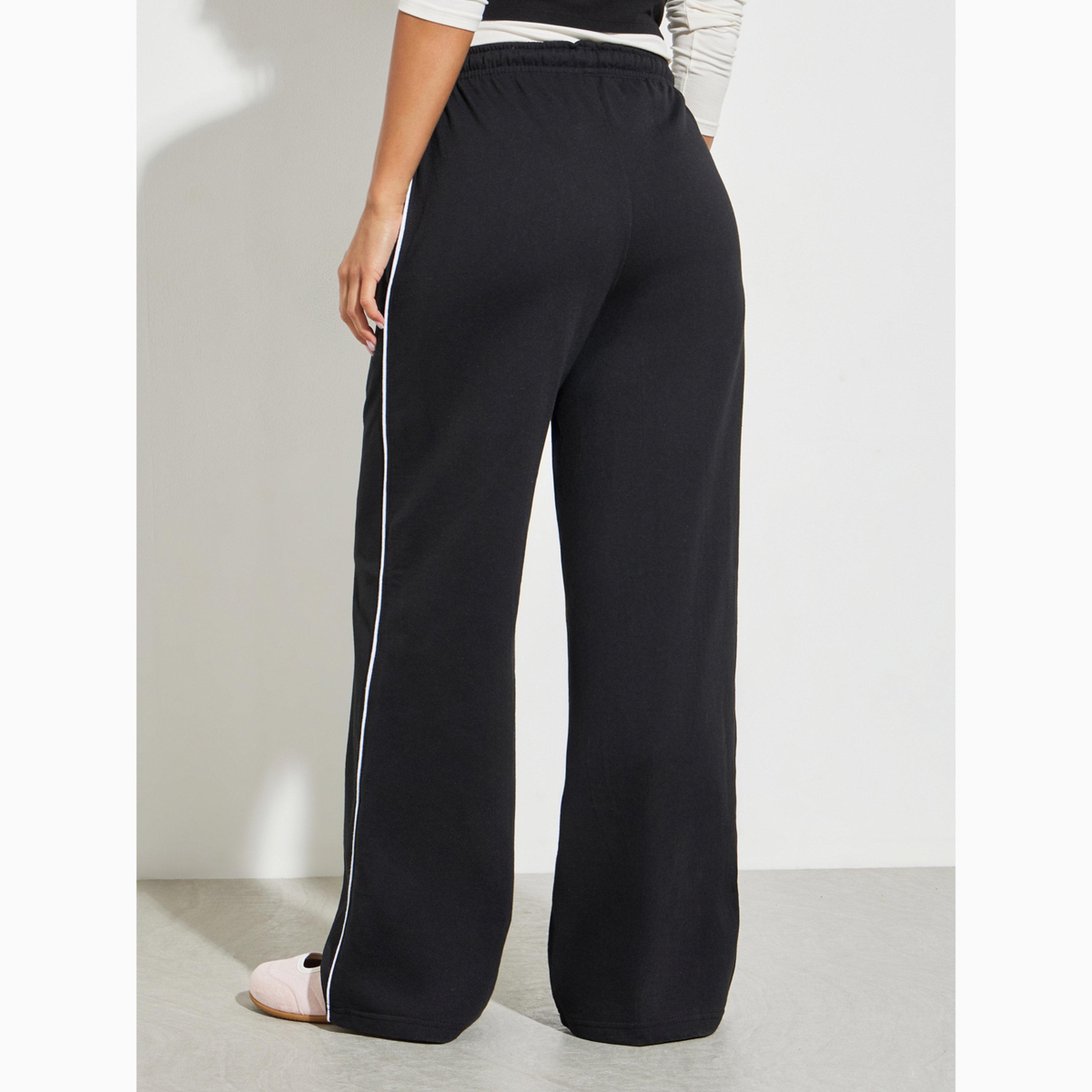 جوغر بأرجل واسعة وتفاصيل خطوط أسود-women-clothing-bottoms-joggers-image-4