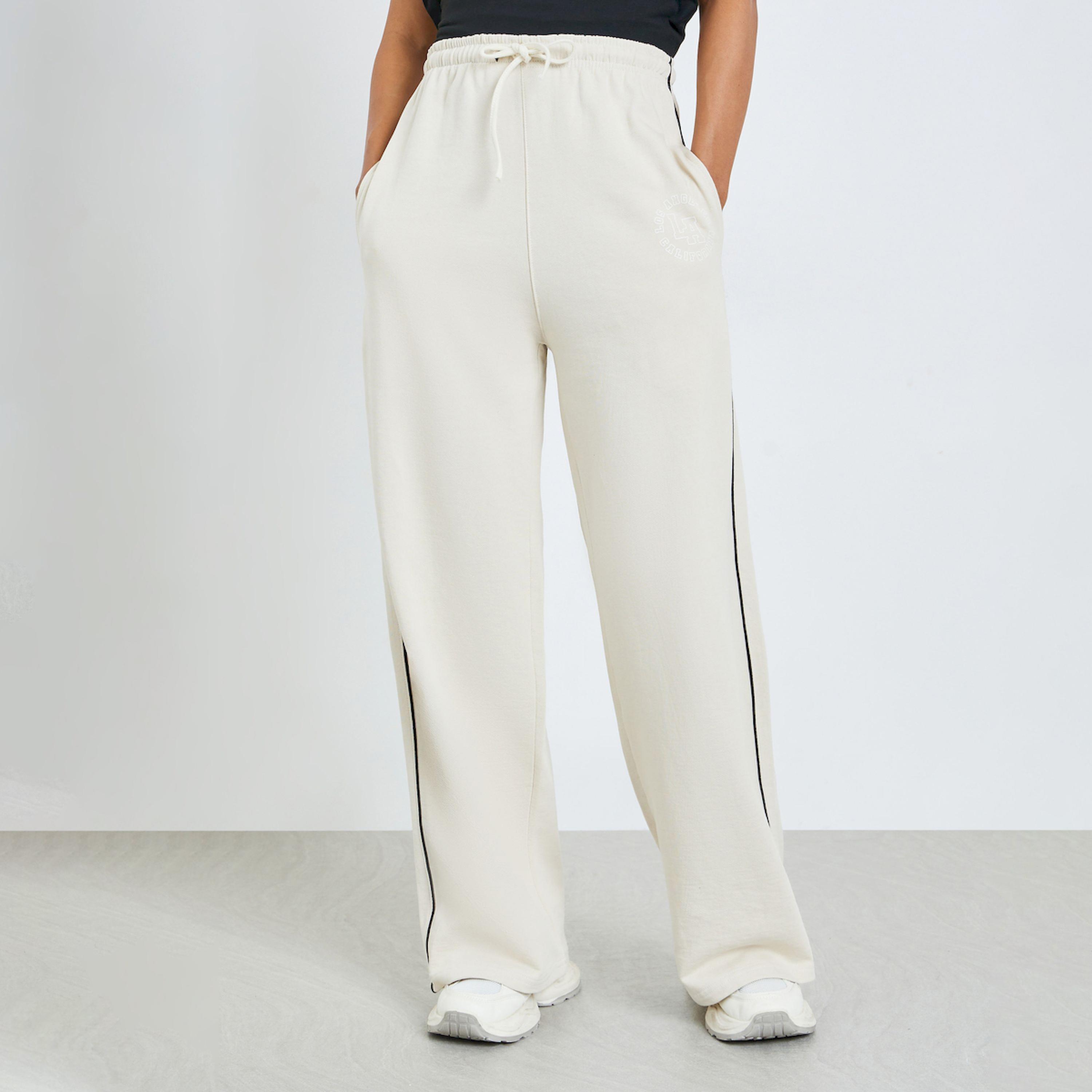 جوغر بأرجل واسعة وبرباط-women-clothing-bottoms-joggers-image-1