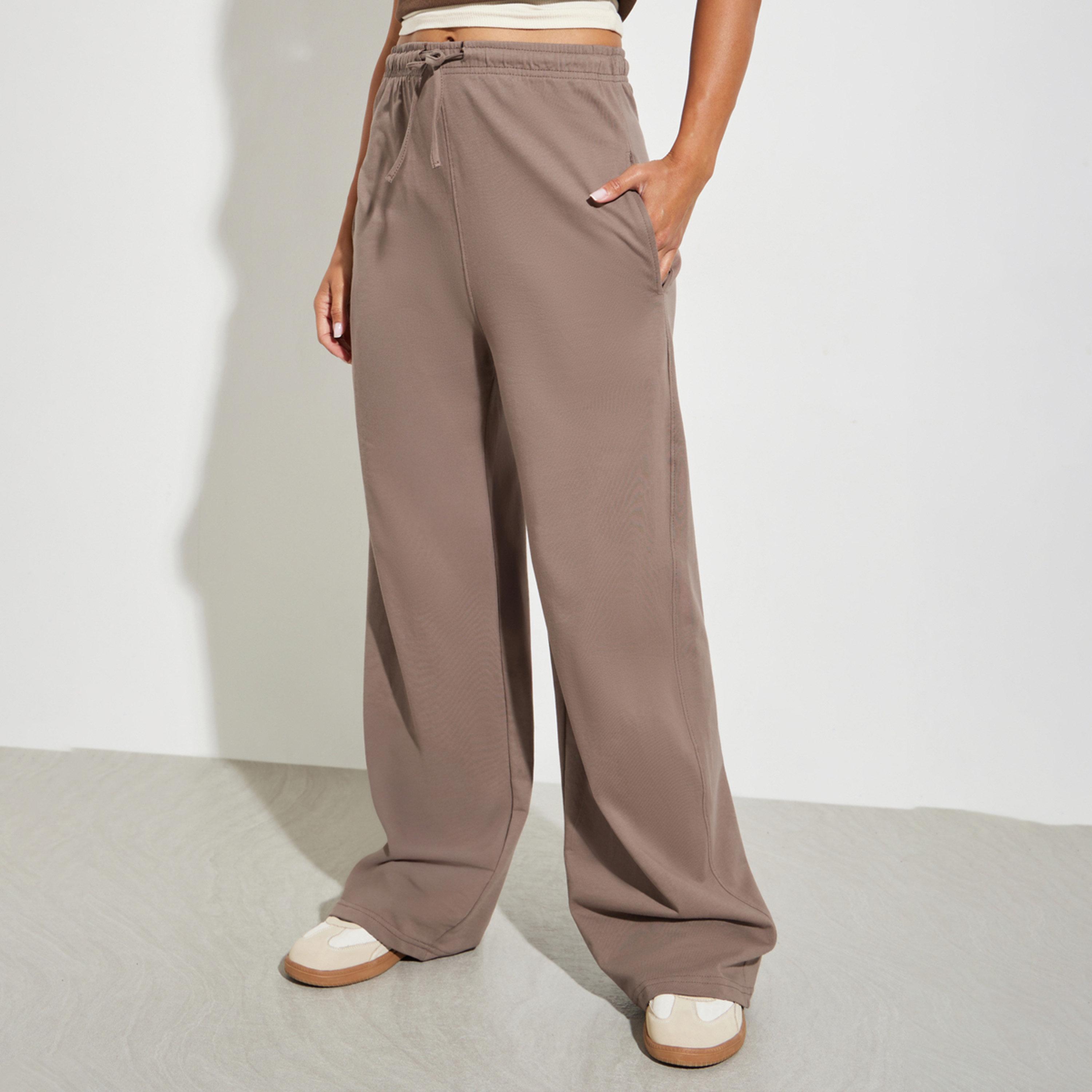 جوغر بأرجل واسعة ورباط بني-women-clothing-bottoms-joggers-image-1
