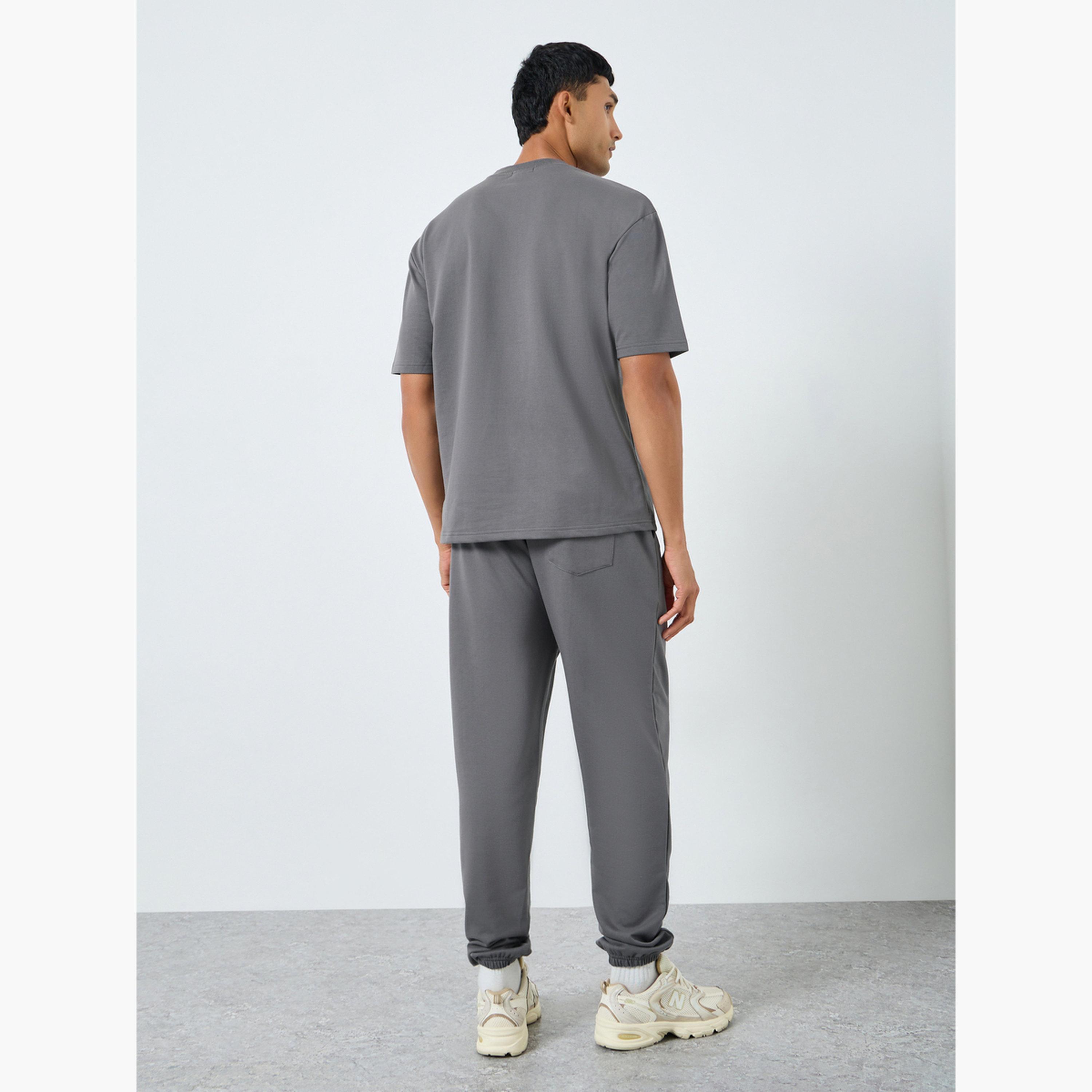 Styli Men Short Sleeve Oversized T-Shirt and Joggers Co-Ords-men-clothing-coordsets-image-5