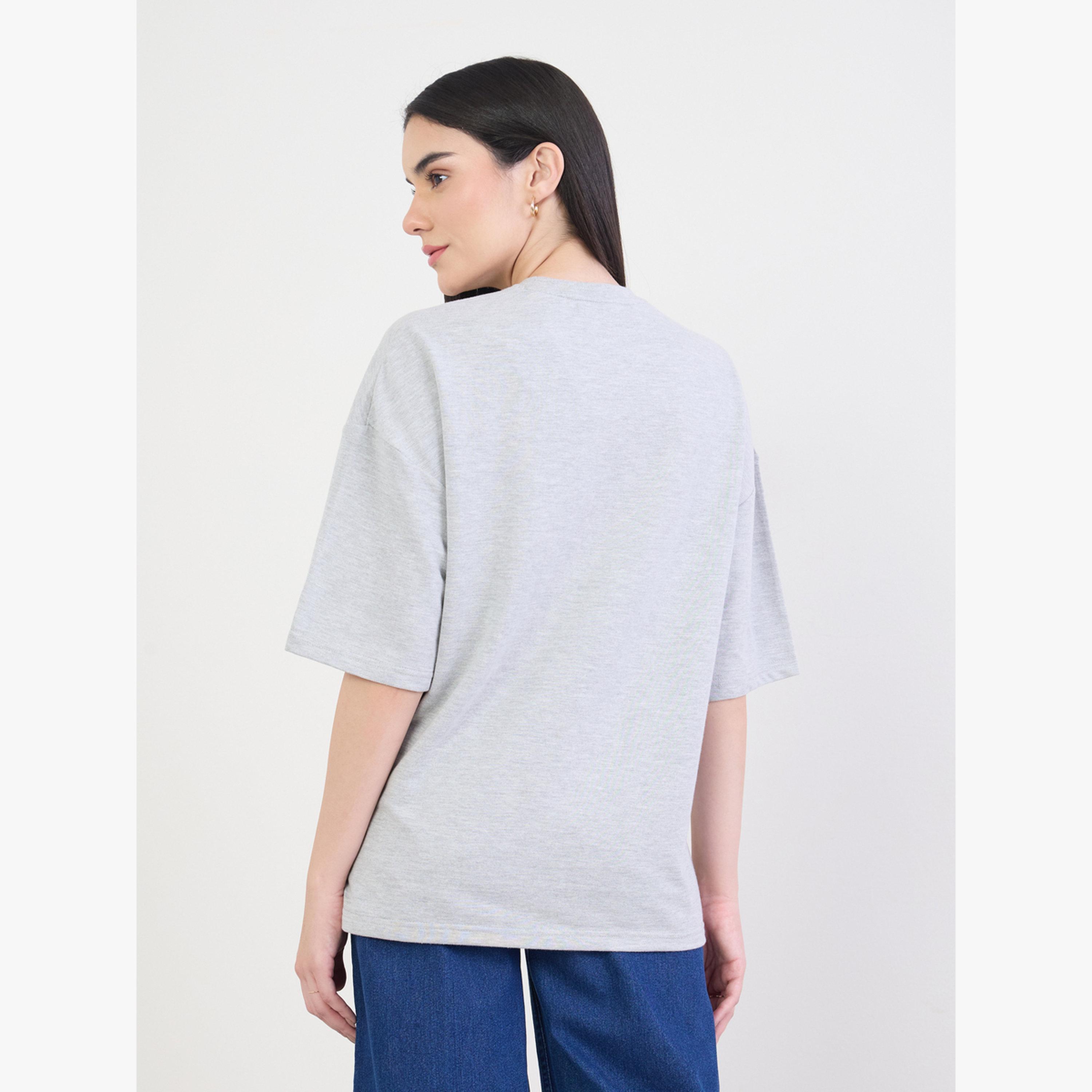 تيشيرت واسع بطبعة جرافيك-women-clothing-tshirts-image-5