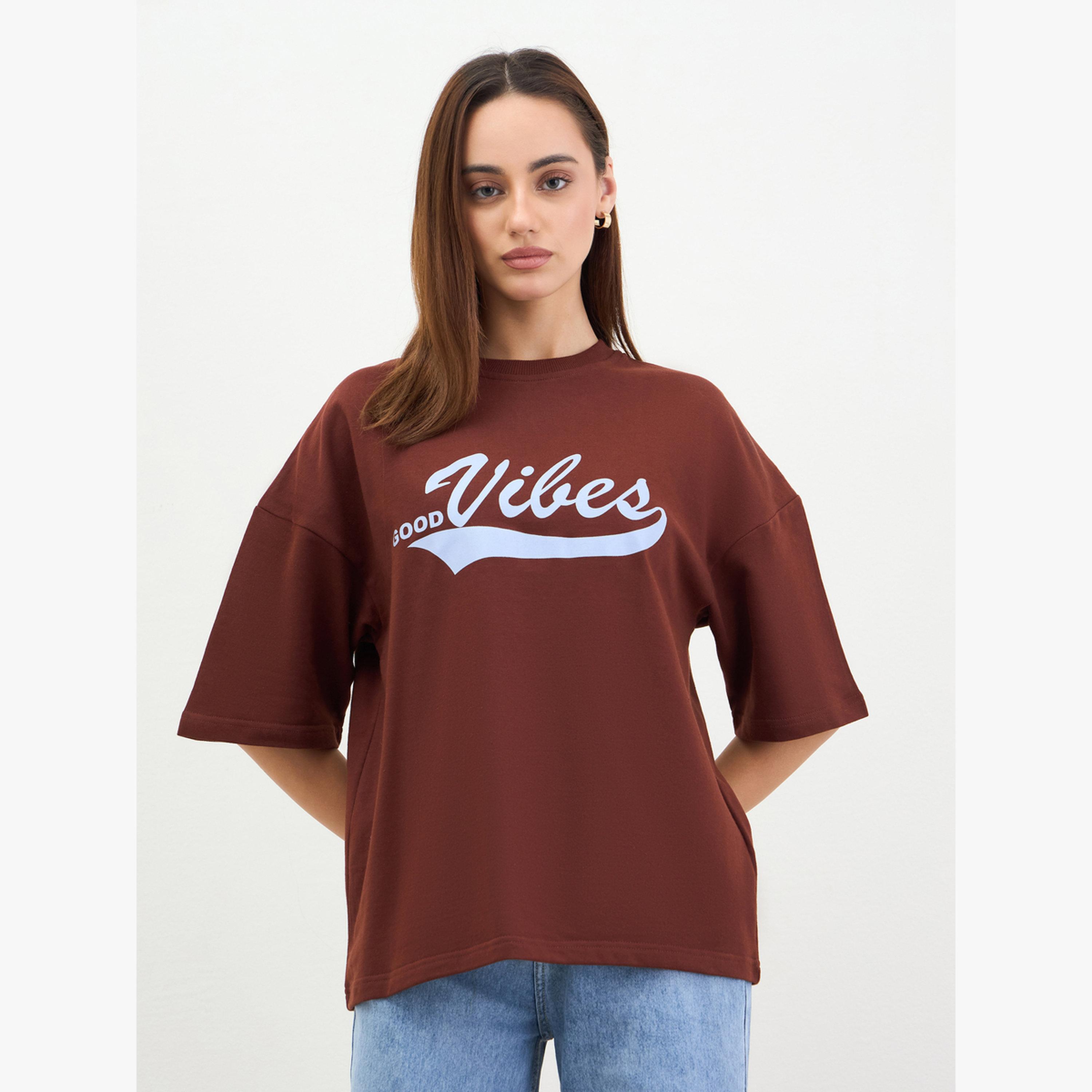 Styli Women Oversized Brown Slogan Print T-Shirt-women-clothing-tshirts-image-1