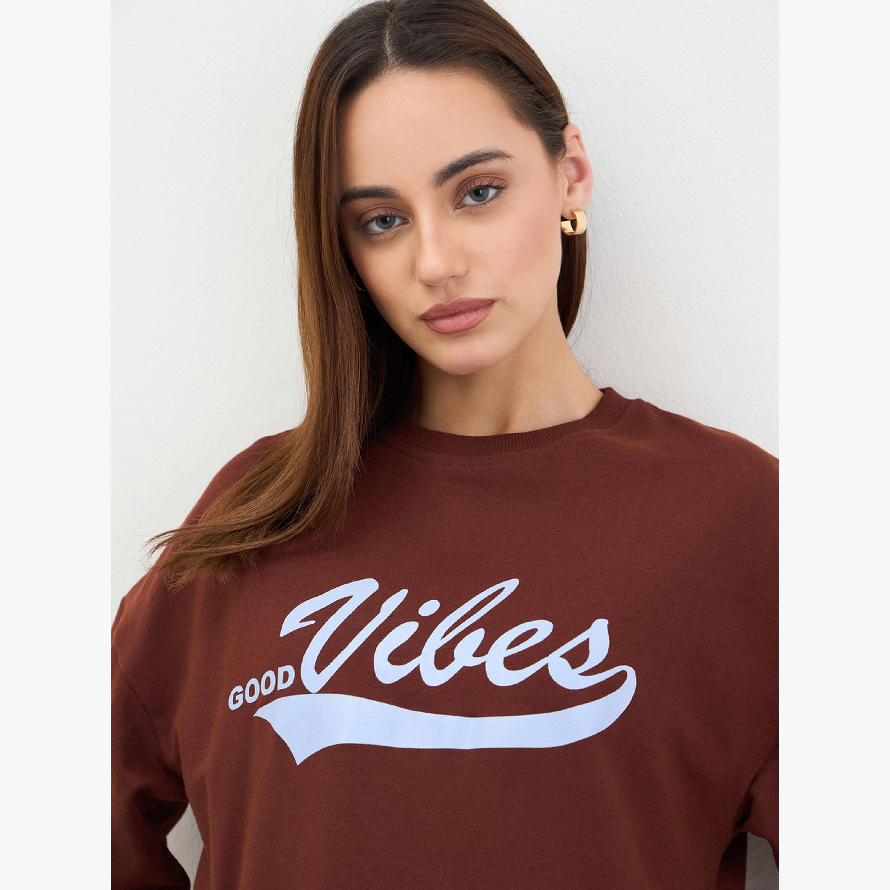 Styli Women Oversized Brown Slogan Print T-Shirt-women-clothing-tshirts-image-4