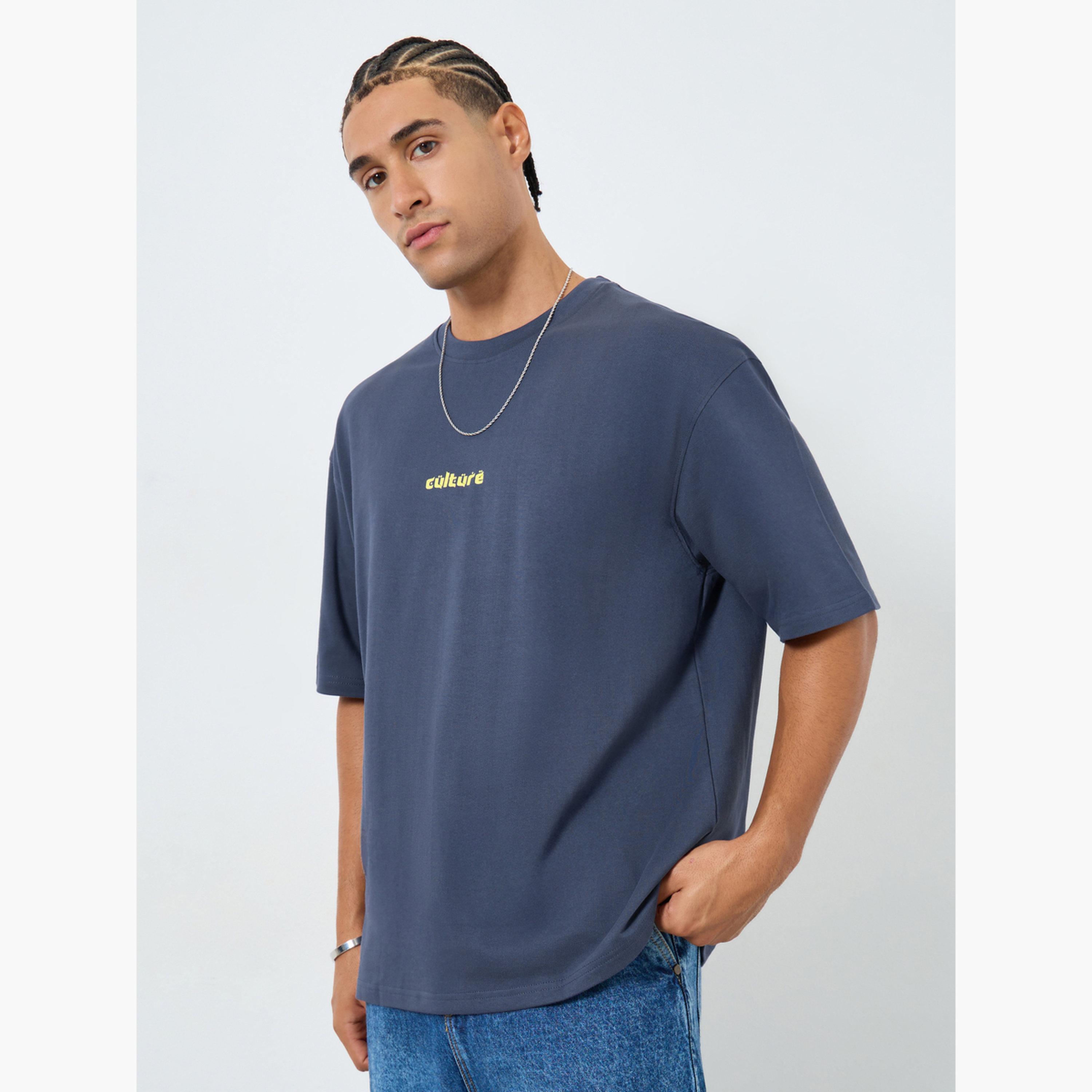ستايلي - تي شيرت رجالي مقاس واسع برسومات غرافيكية لون أزرق داكن-men-clothing-tshirtsandpolos-tshirts-image-1