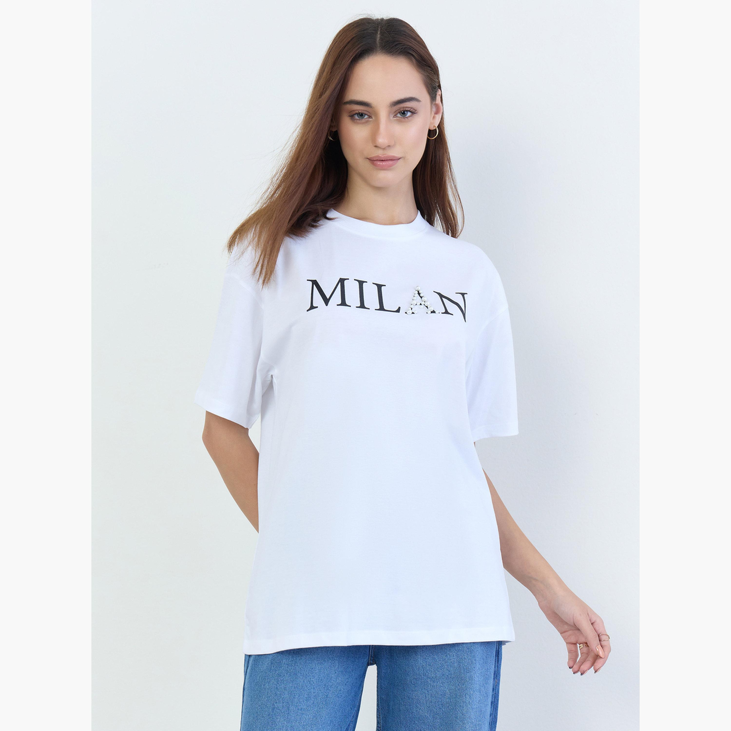 ستايلي - تي شيرت أبيض مقاس واسع بطبعة عليه شعار-women-clothing-tshirts-image-1