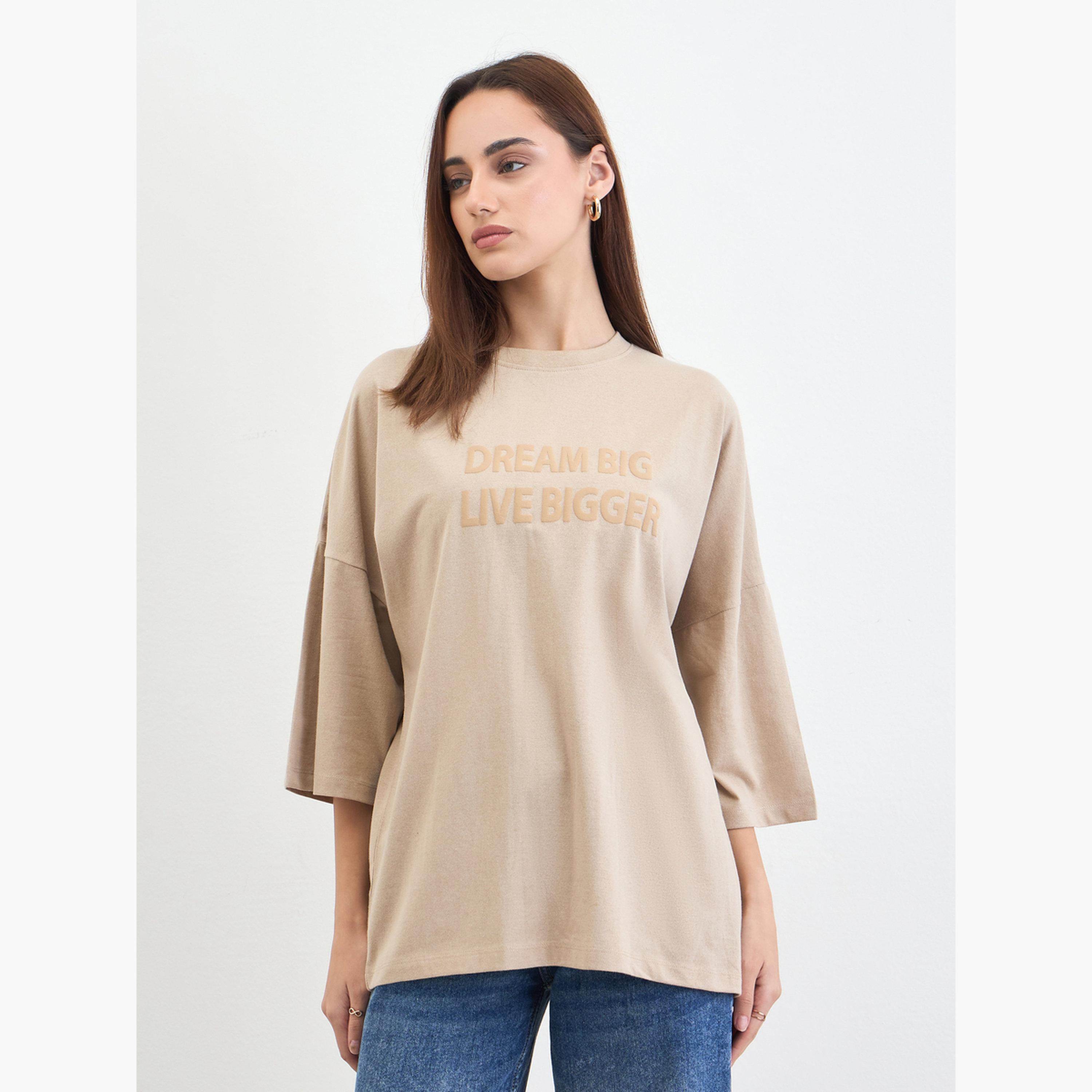 Styli Beige Slogan Embossed Oversized T-Shirt-women-clothing-tshirts-image-1