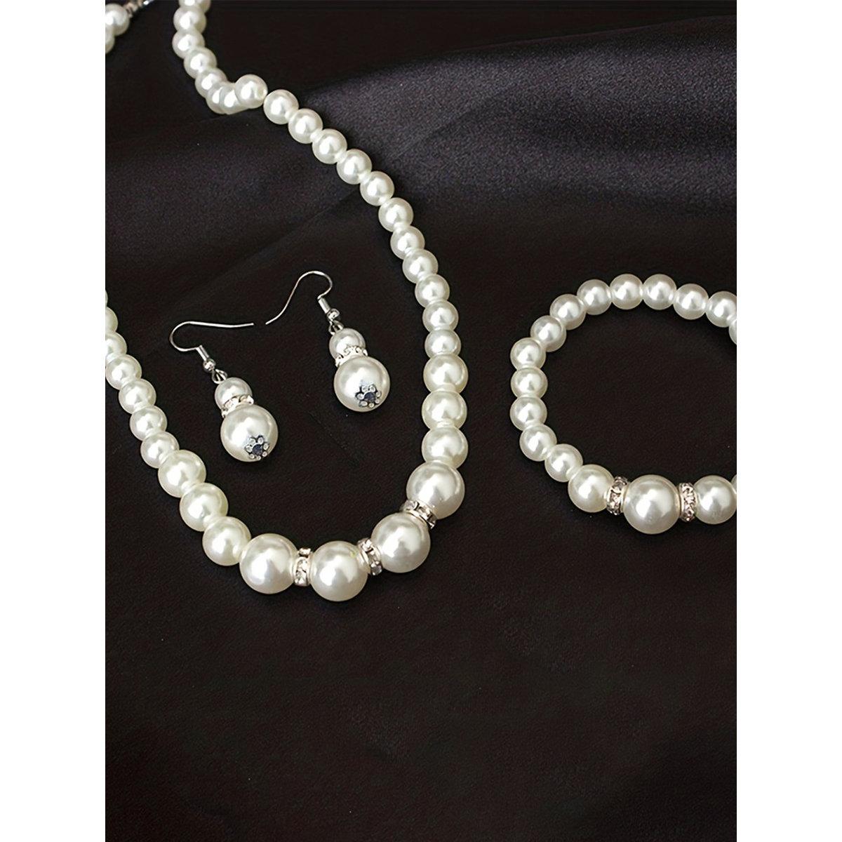 طقم من قلادة مع أقراط وسوار-women-watchesandjewellery-jewellery-jewellerysets-image-1