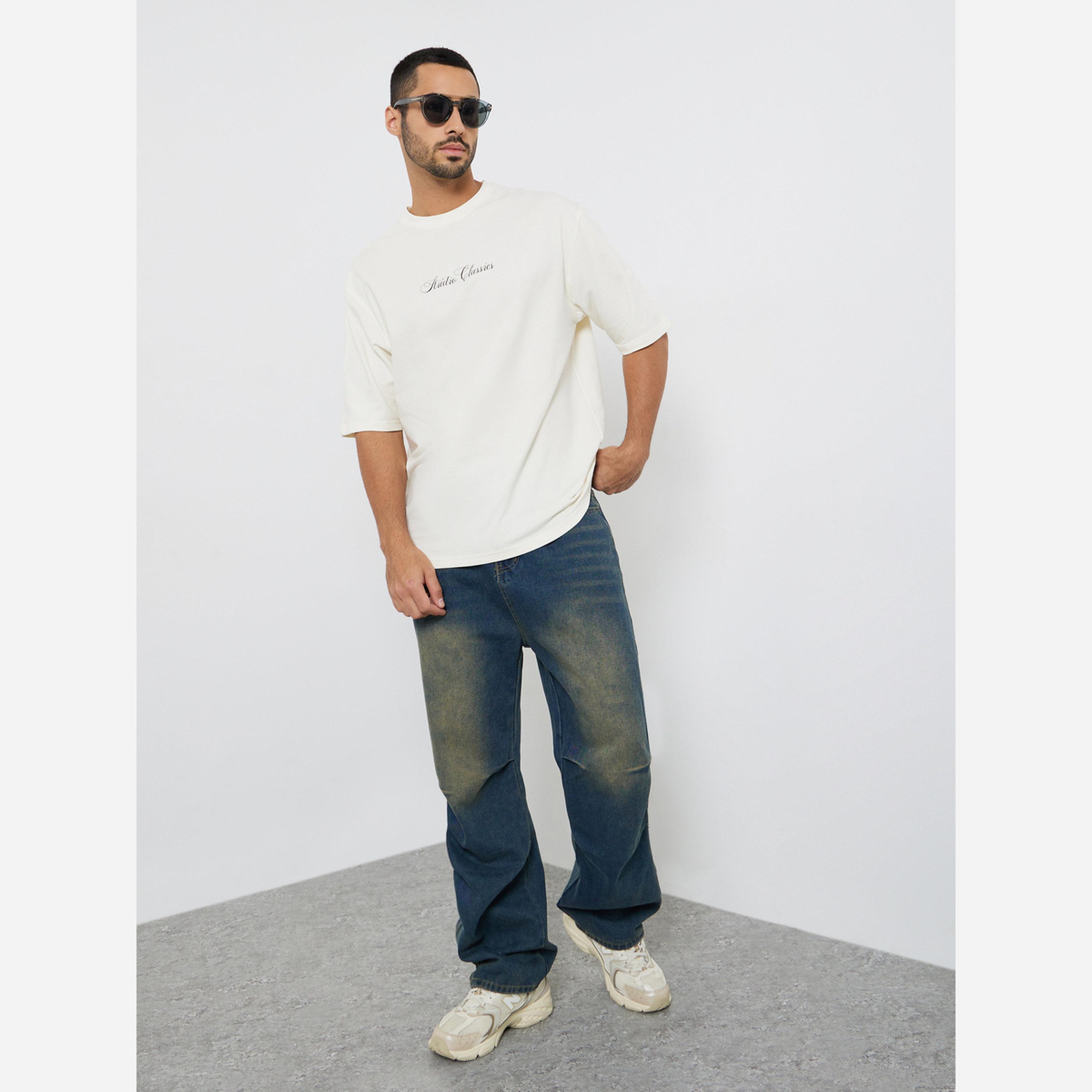 ستايلي - تيشيرت رجالي لون بيج طبعة رسومات مقاس واسع-men-clothing-tshirtsandpolos-tshirts-image-2