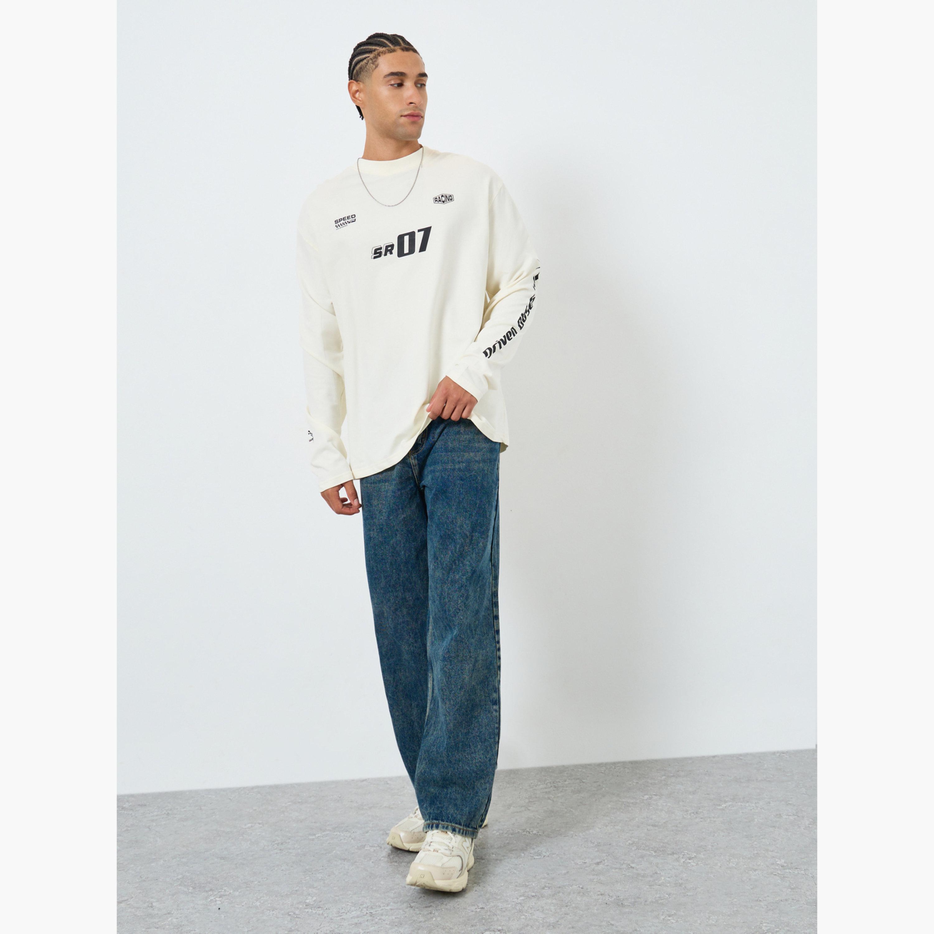 ستايلي - تي شيرت رجالي مقاس واسع برسومات غرافيكية باللون الكريمي-men-clothing-tshirtsandpolos-tshirts-image-2